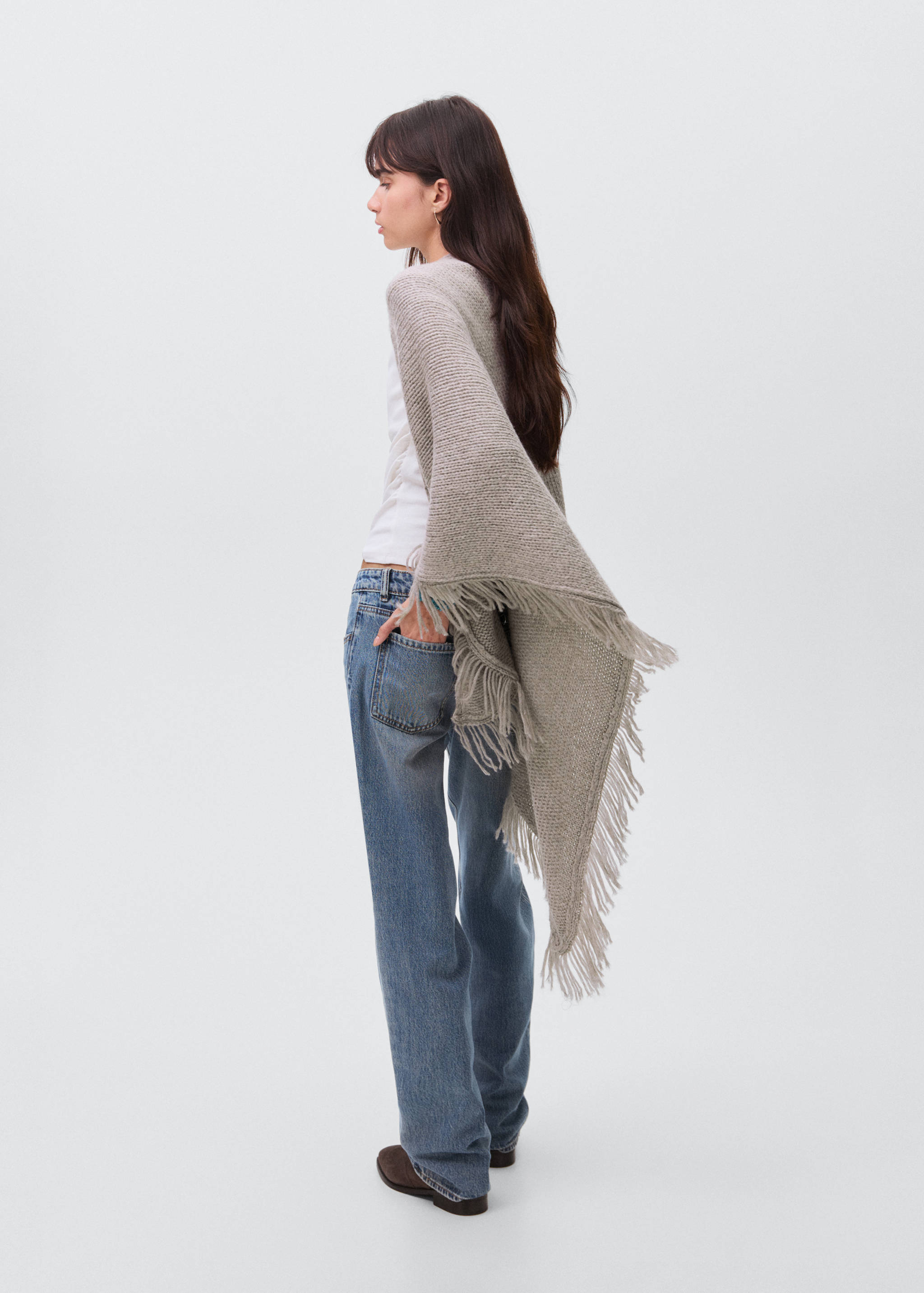 Poncho en maille à franges - Verso de l’article