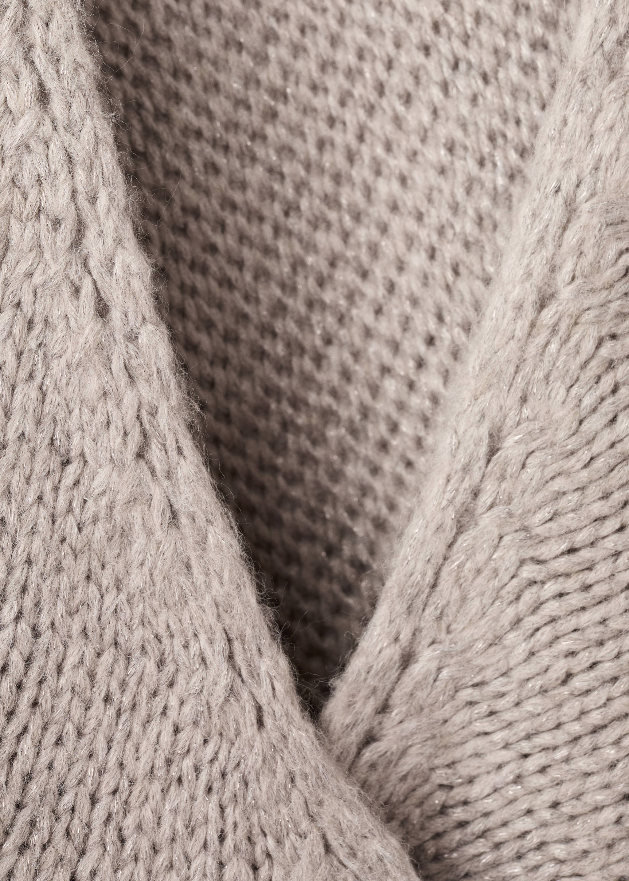 Poncho en maille à franges - Détail de l'article 0