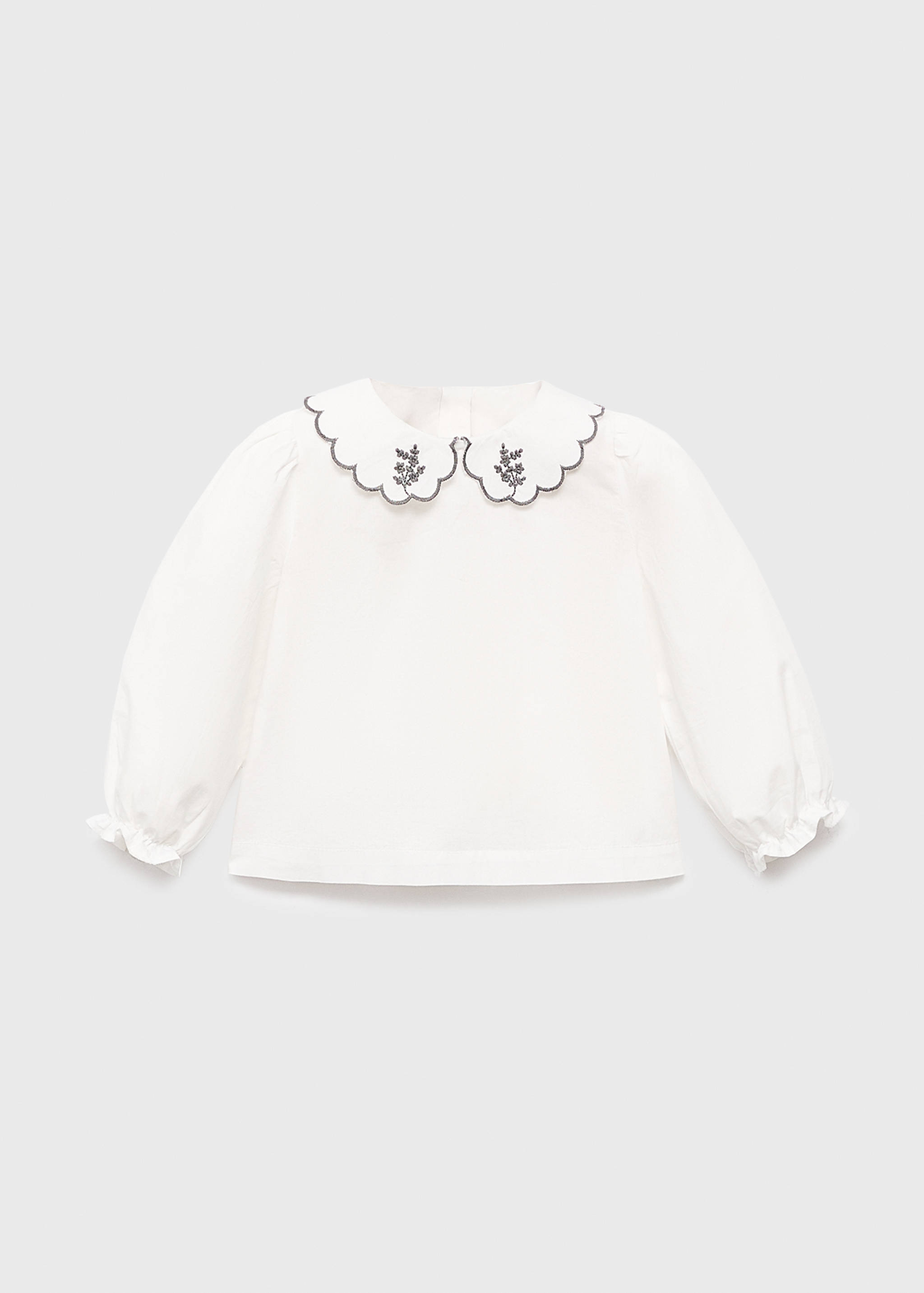 بلوزة مطرزة بياقة بيبي دول - منتج دون نموذج