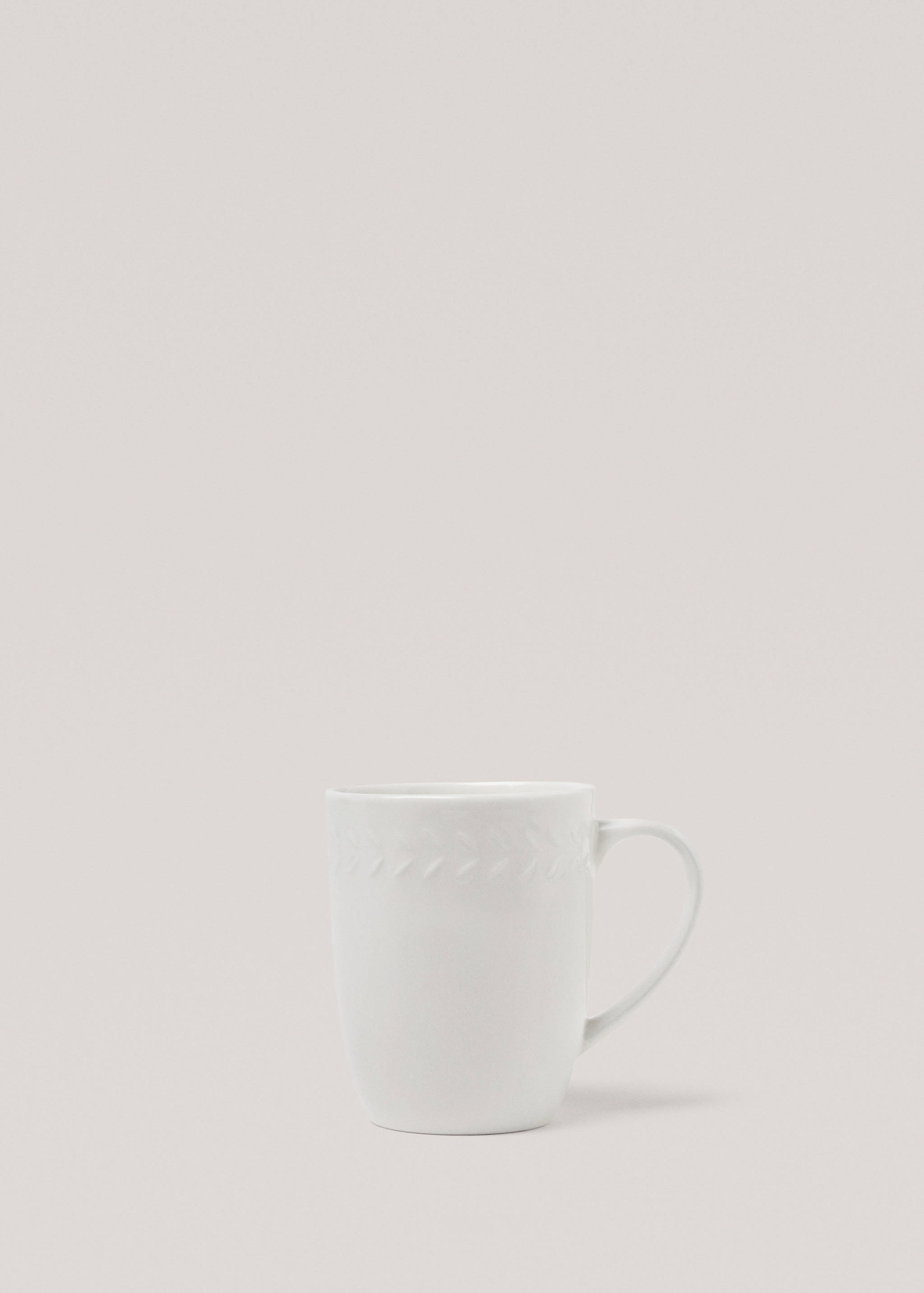 Stoneware embossed coffee cup - Article without model