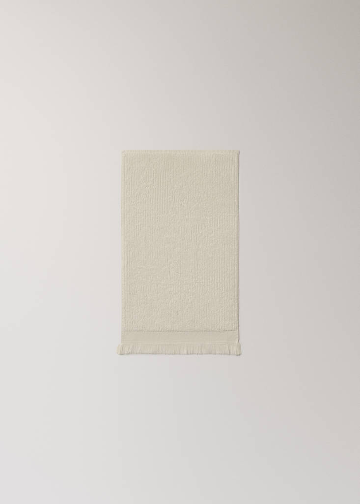 Textured guest towel with fringes — Ecru