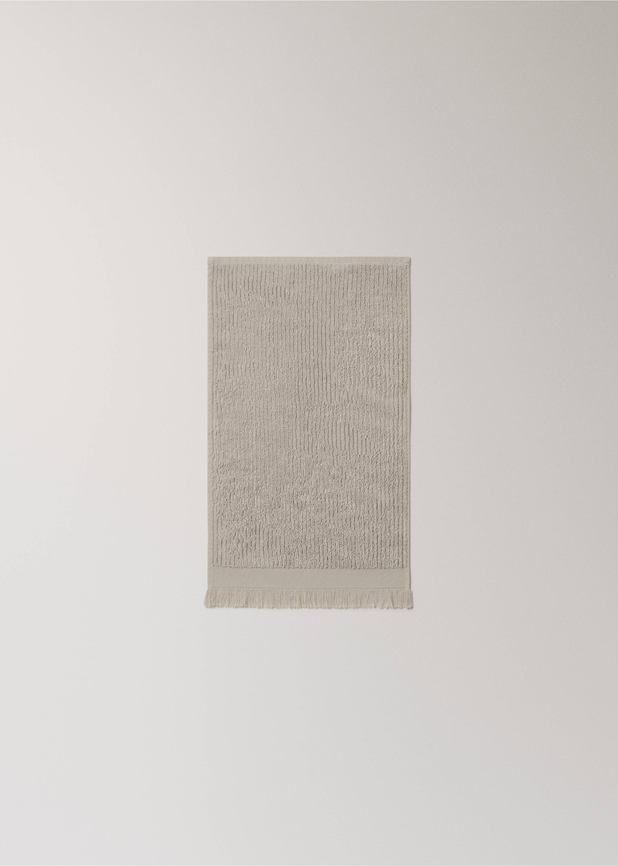 Textured guest towel with fringes - Details of the article 3, Light/Pastel Grey. Ref: 27001563-00.