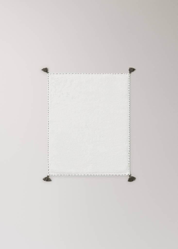 Guest towel with topstitching finish and pompom detail — Off White