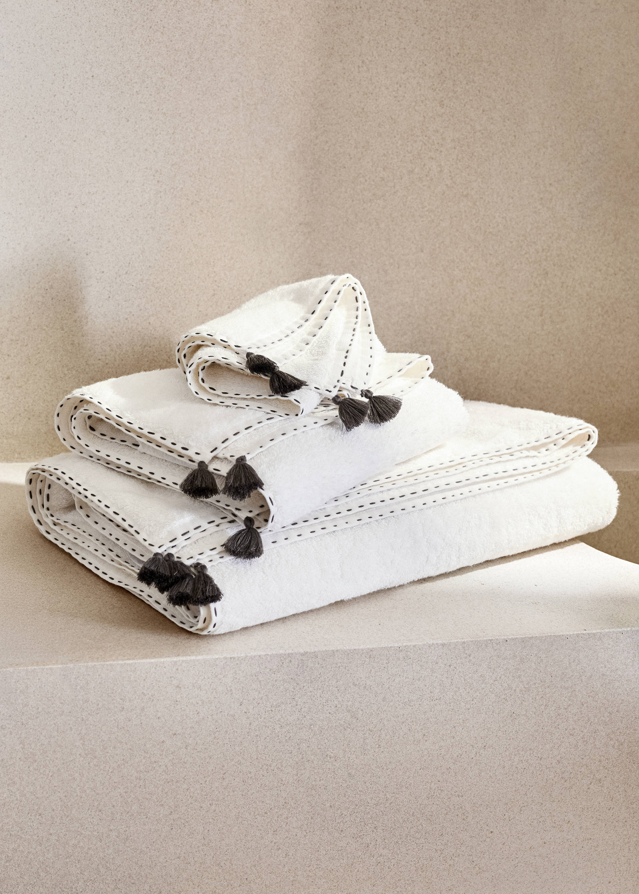 Hand towel with topstitched finish and pompom detail - General plane