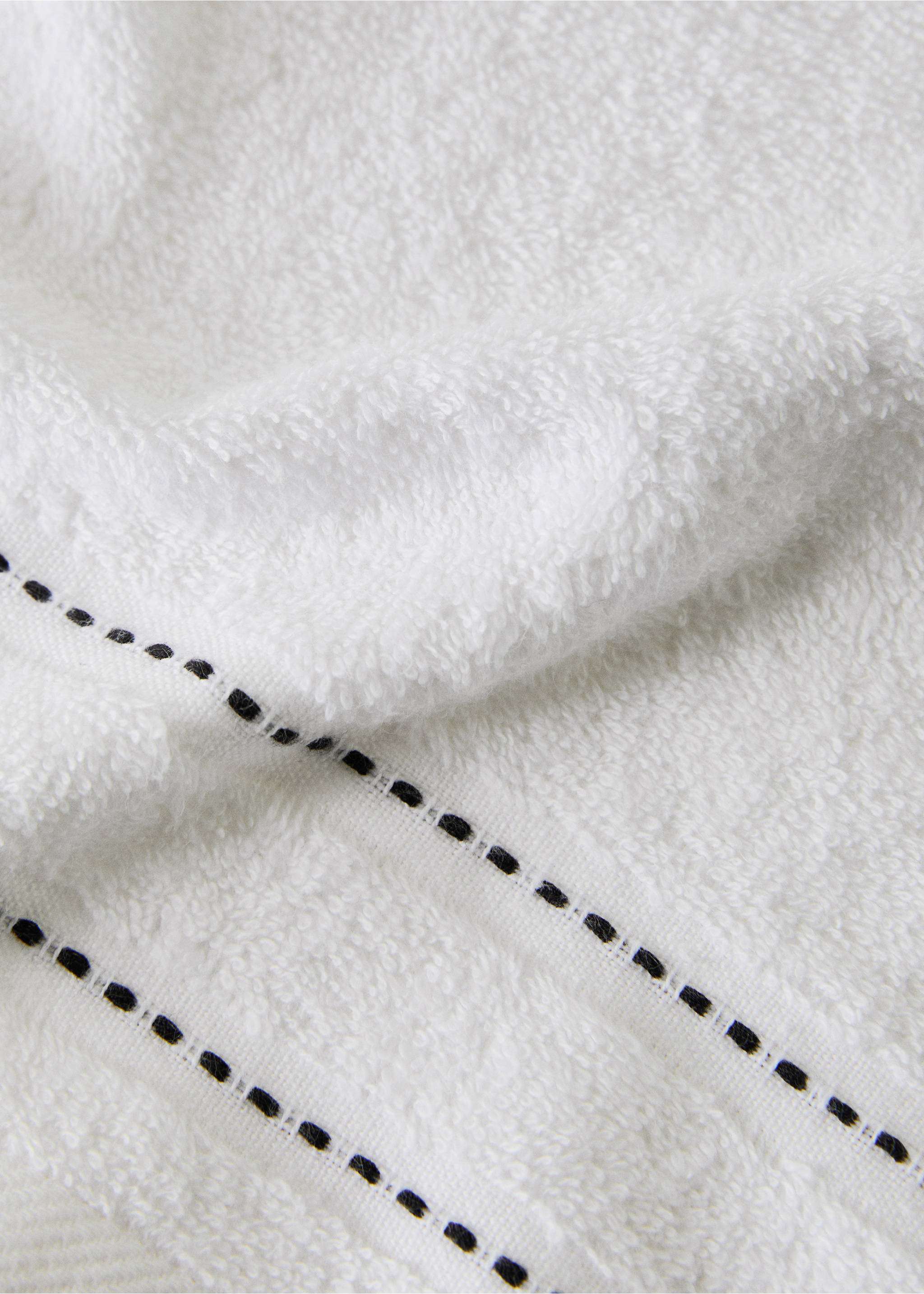 Cotton guest towel with embroidered dots - Details of the article 1, White. Ref: 27001581-00.