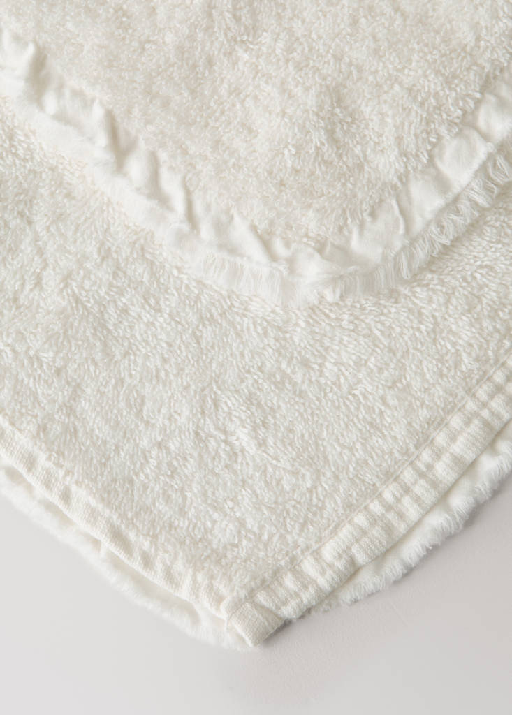 Frayed edge cotton terry hand towel with frill trim — Ecru