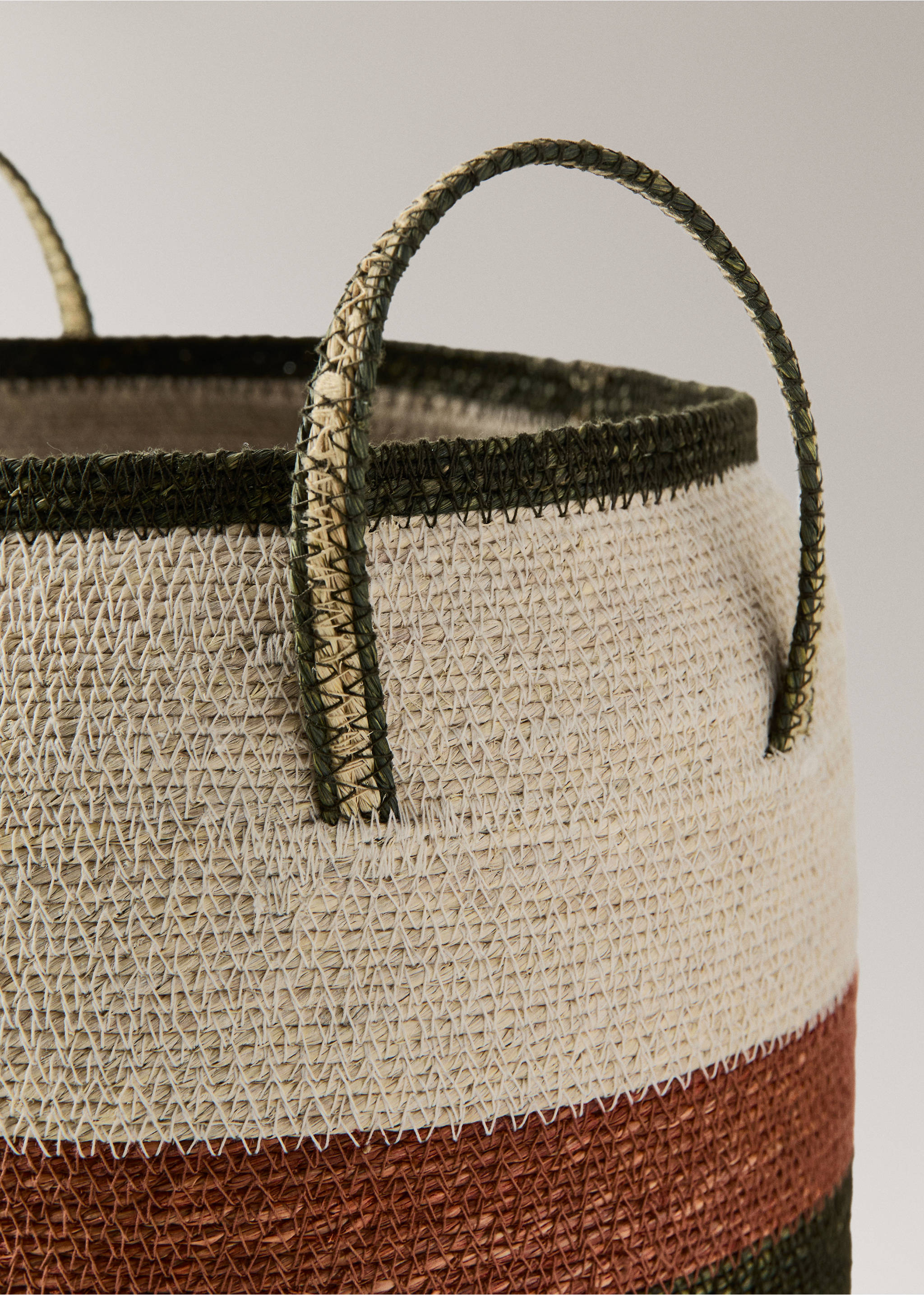 Small oval basket with stripe handles - Details of the article 1, Burnt Orange. Ref: 27003300-00.