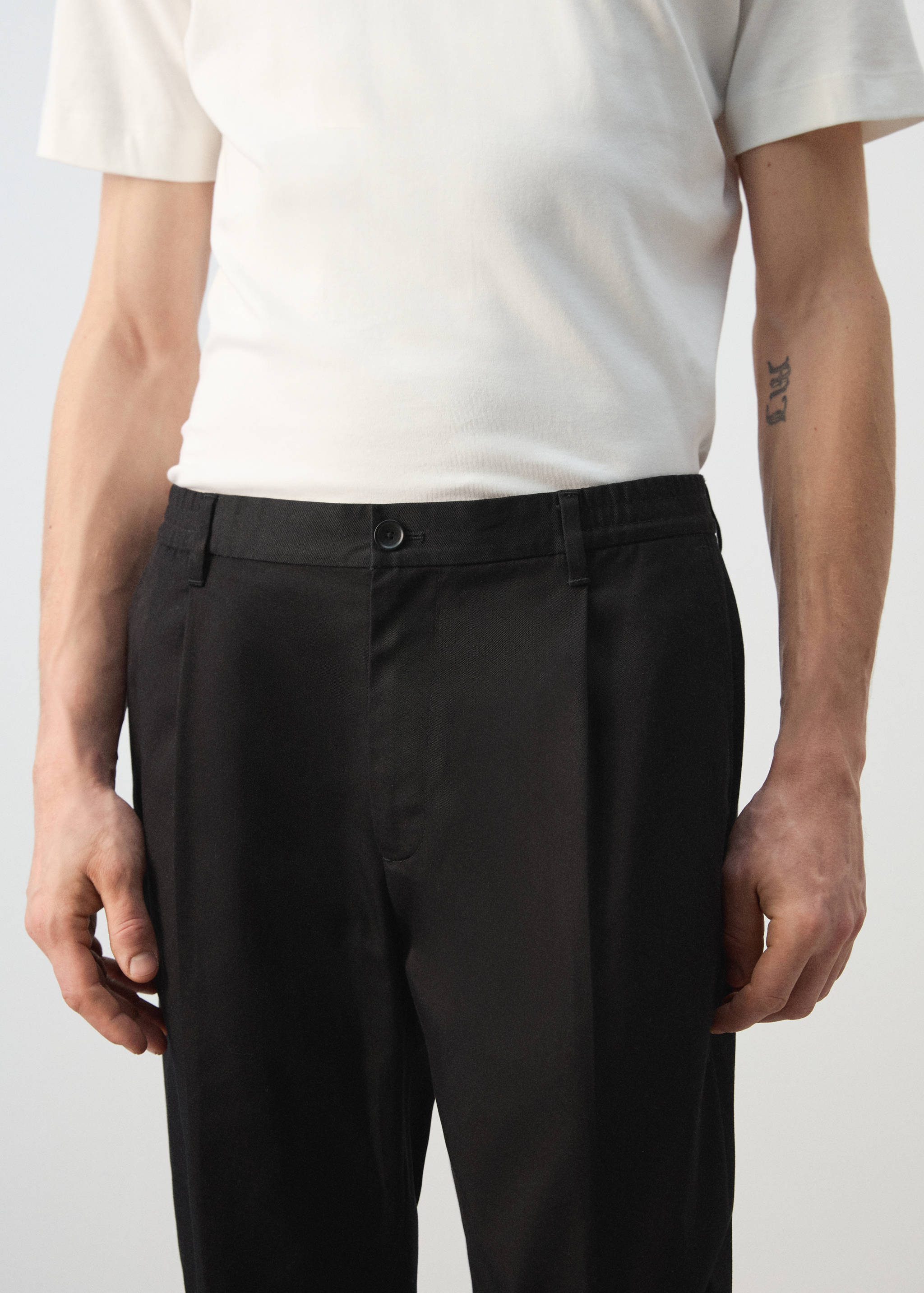 Regular-fit pleated trousers - Details of the article 1