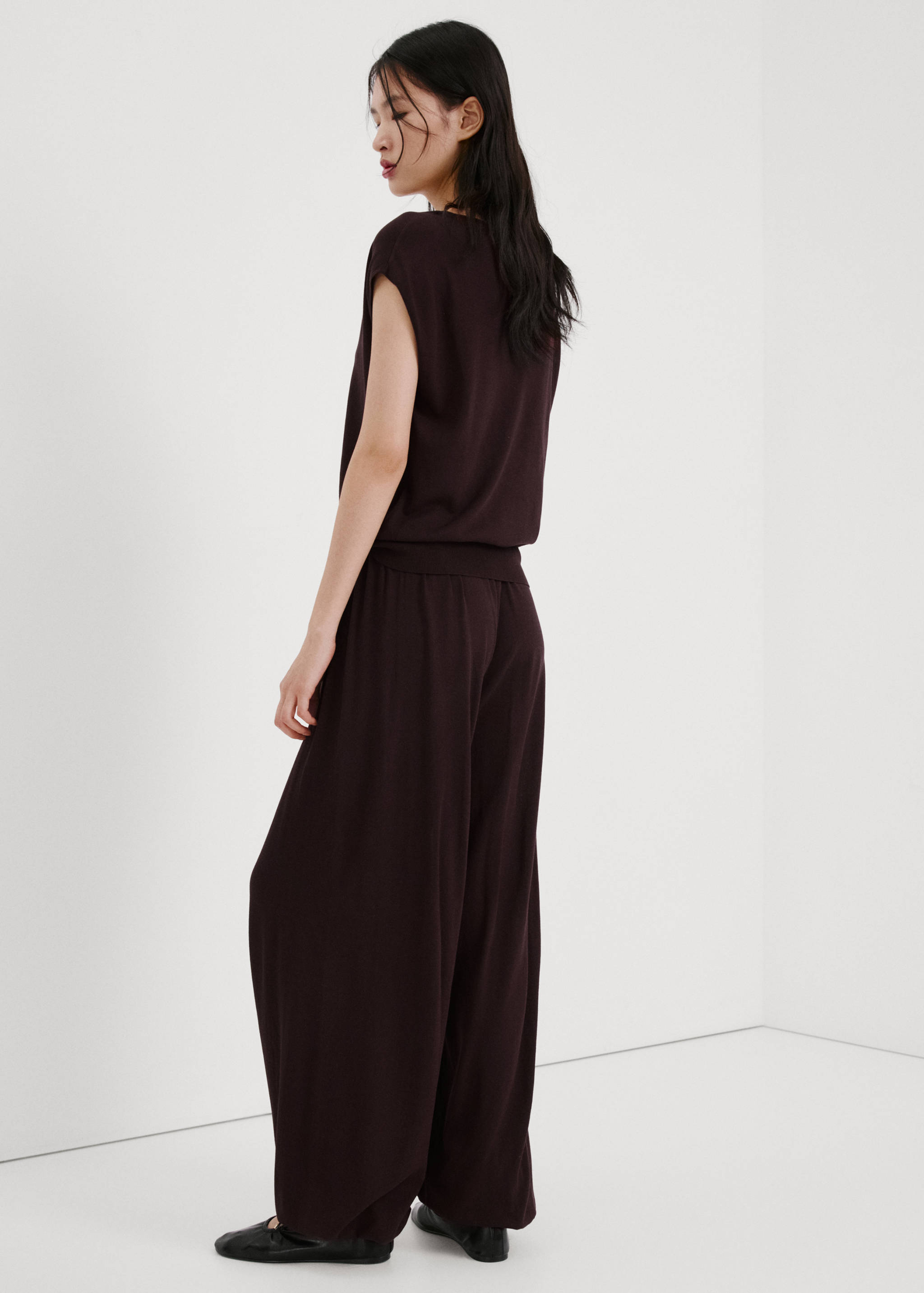 Short-sleeved knitted sweater - Reverse of the article