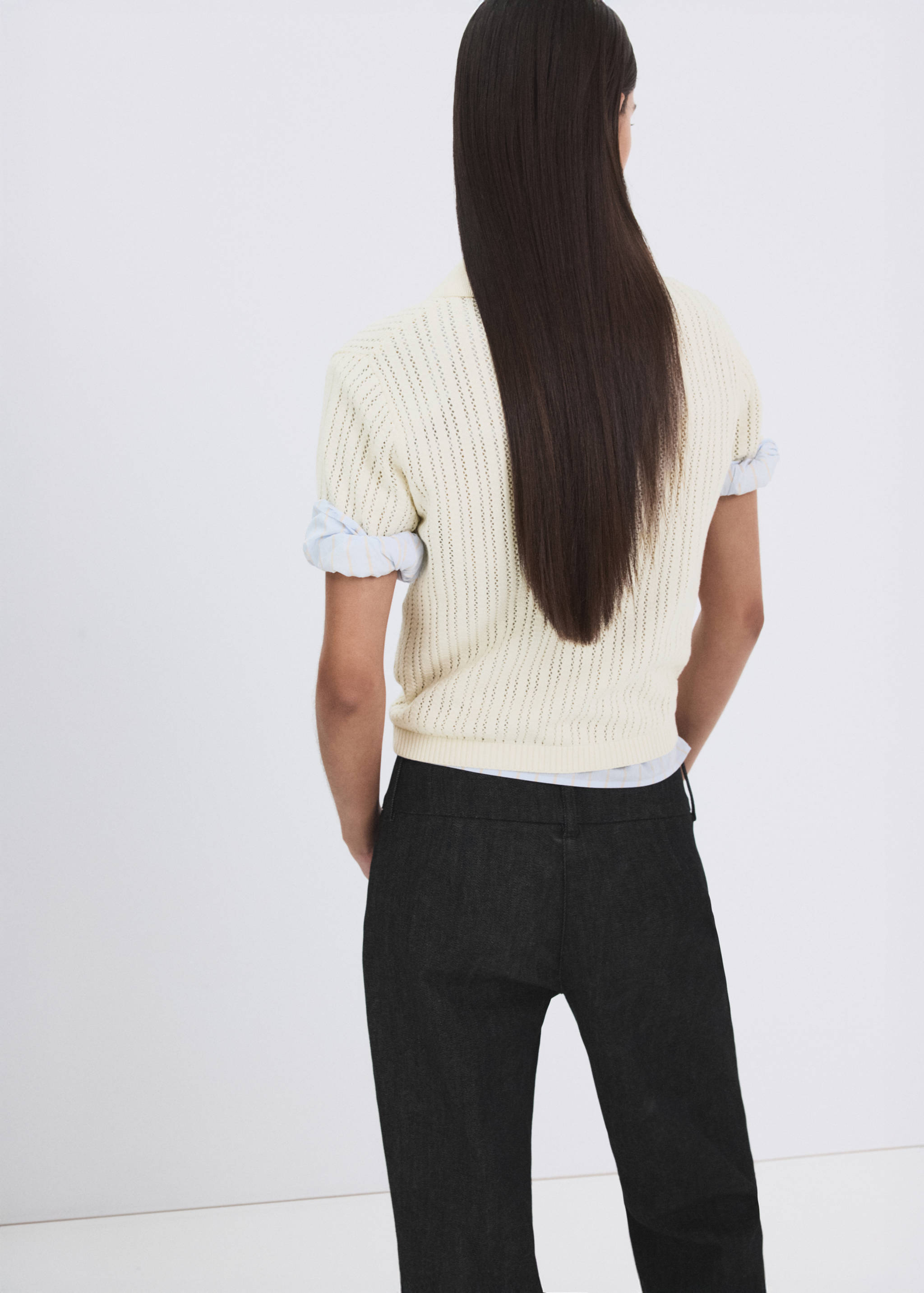 Openwork knitted polo-neck sweater - Reverse of the article