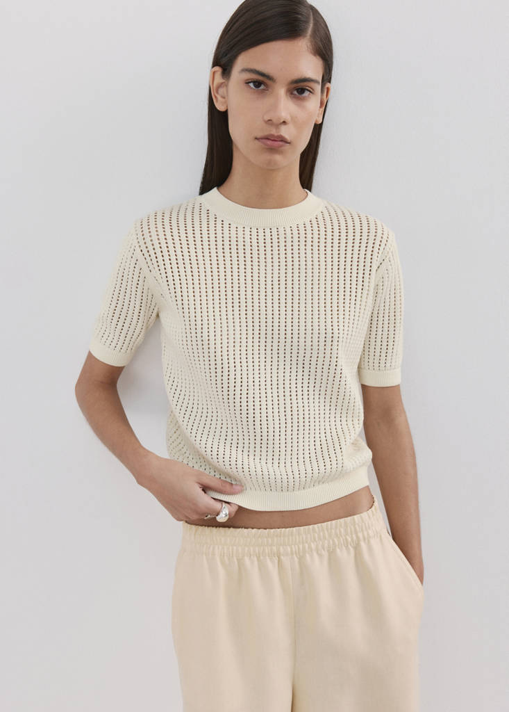 Short-sleeved knitted sweater with lace accents