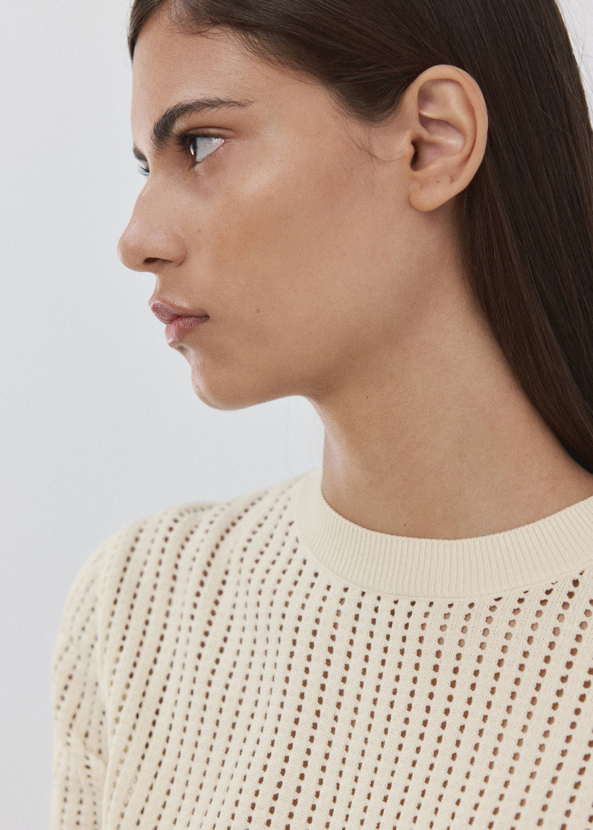 Short-sleeved openwork knitted sweater - Details of the article 1