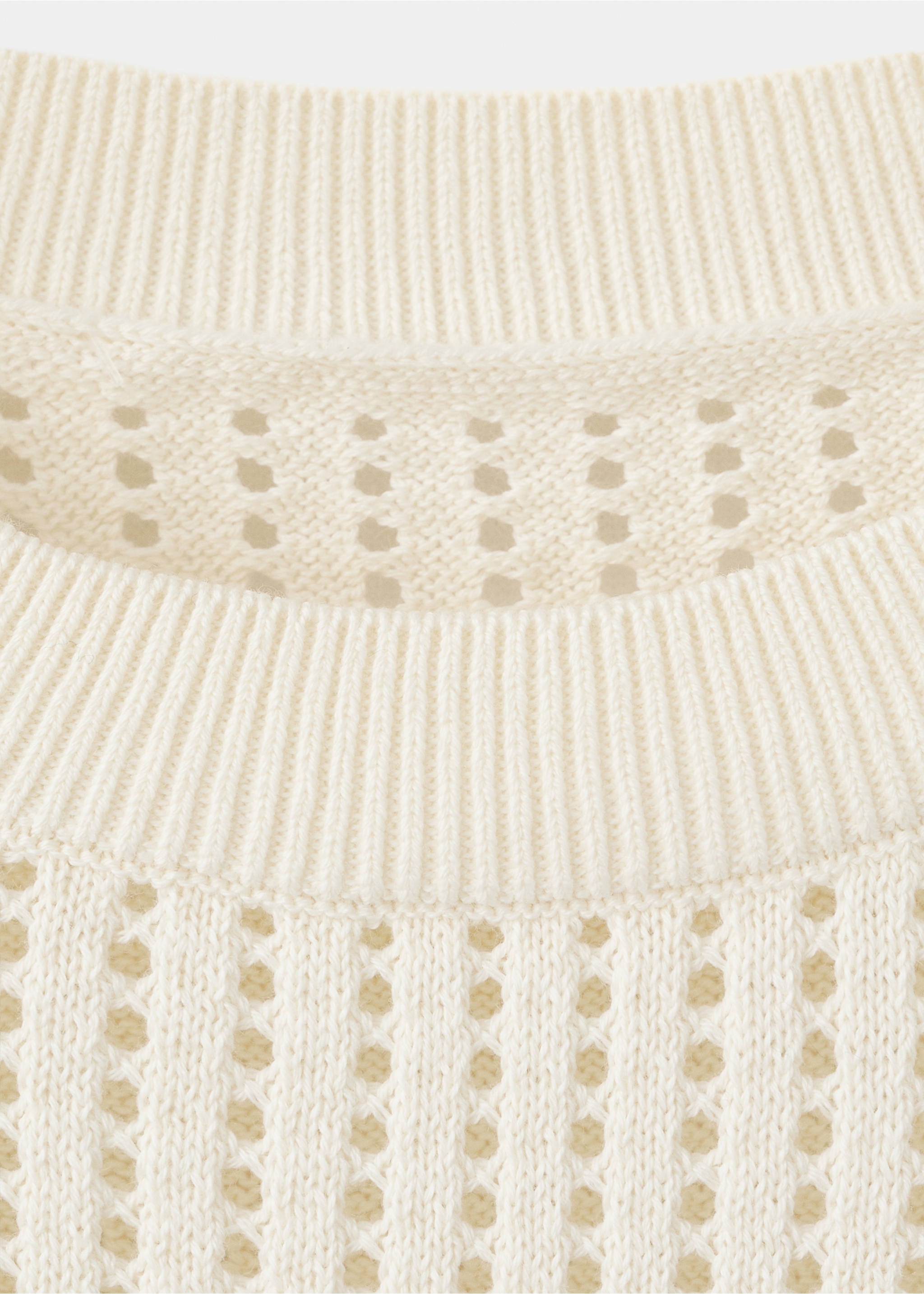 Short-sleeved openwork knitted sweater - Details of the article 8, Ecru. Ref: 27005830-00.