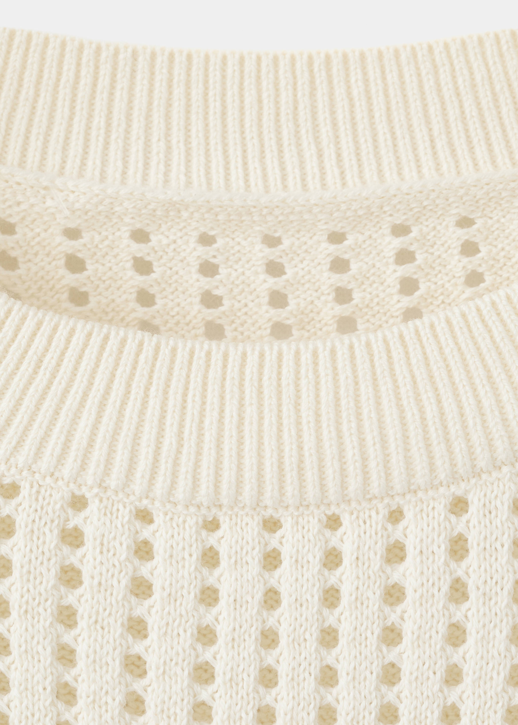 Short-sleeved openwork knitted sweater - Details of the article 8