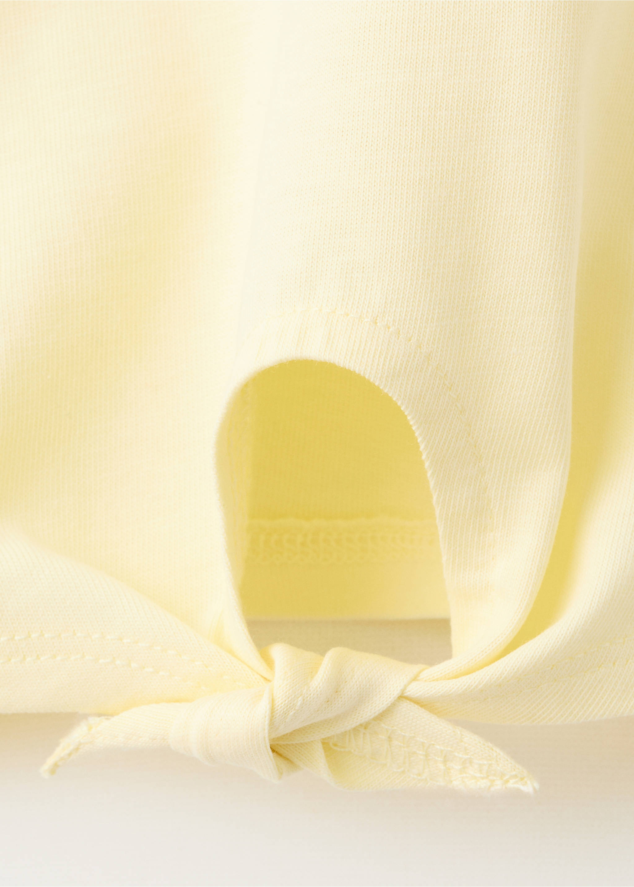 Embroidered T-shirt with knot detail - Details of the article 0, Pastel Yellow. Ref: 27006762-00.