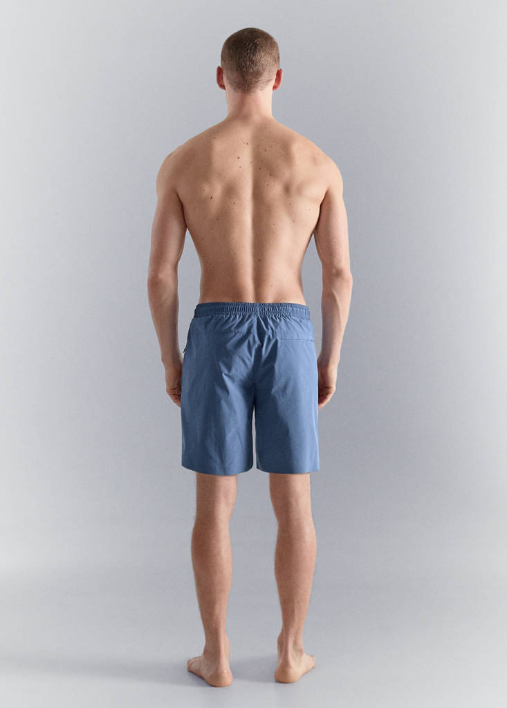 Swimsuit with zip pockets — China Blue