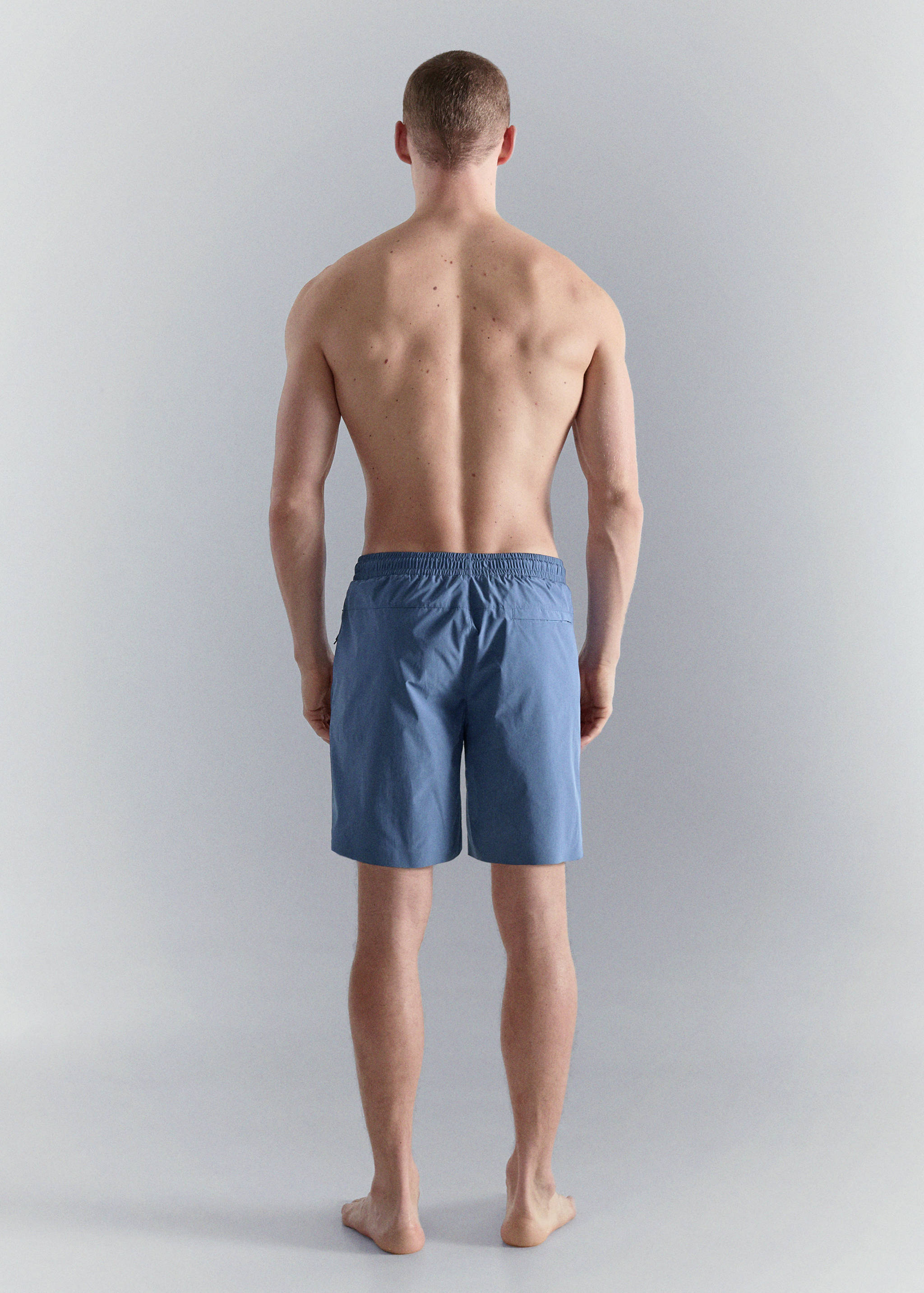 Swimsuit with zip pockets - Reverse of the article