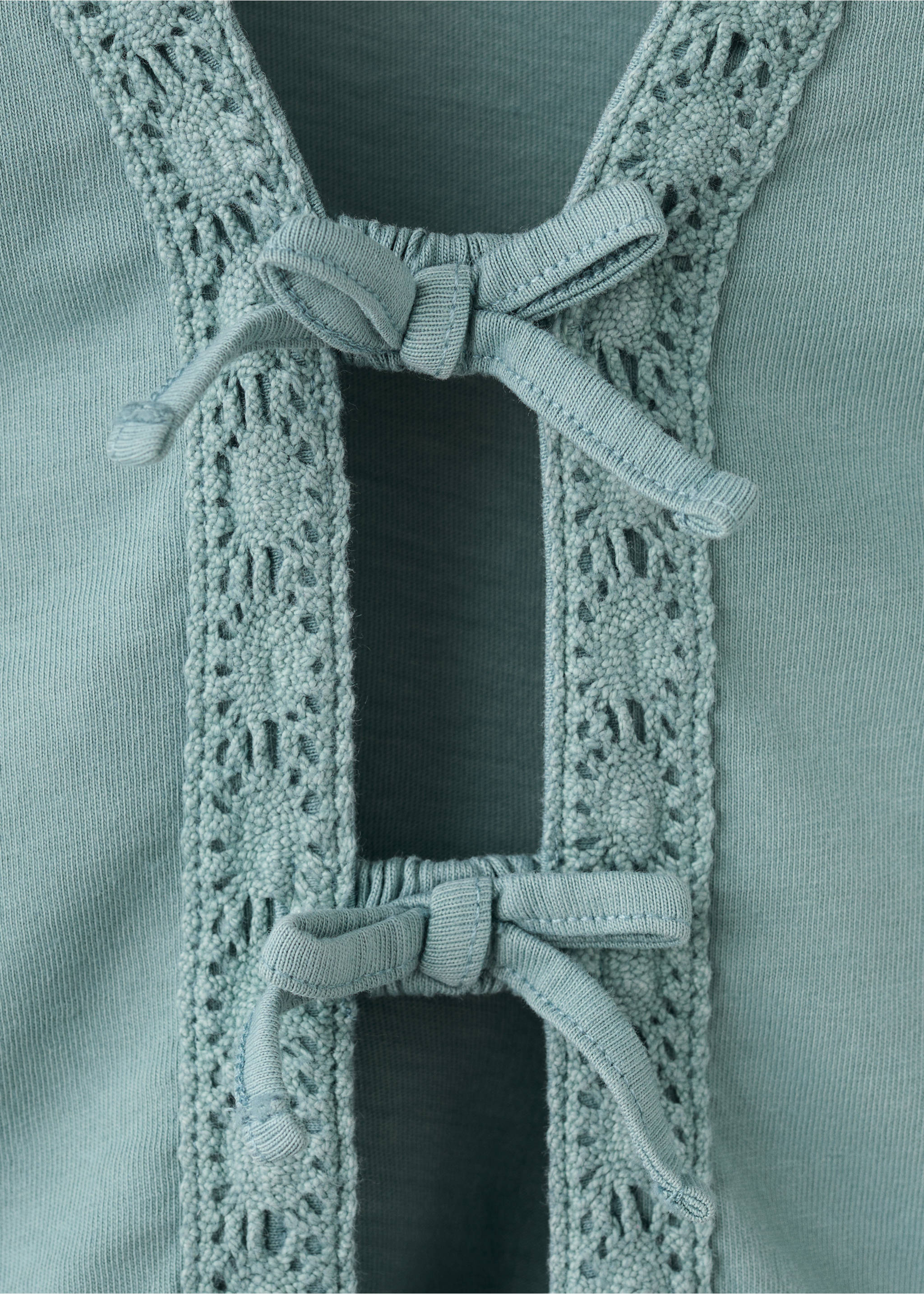 Haut à nœuds avec détails broderie - Détail de l'article 8, Bleu pétrole. Ref: 27007942-00.