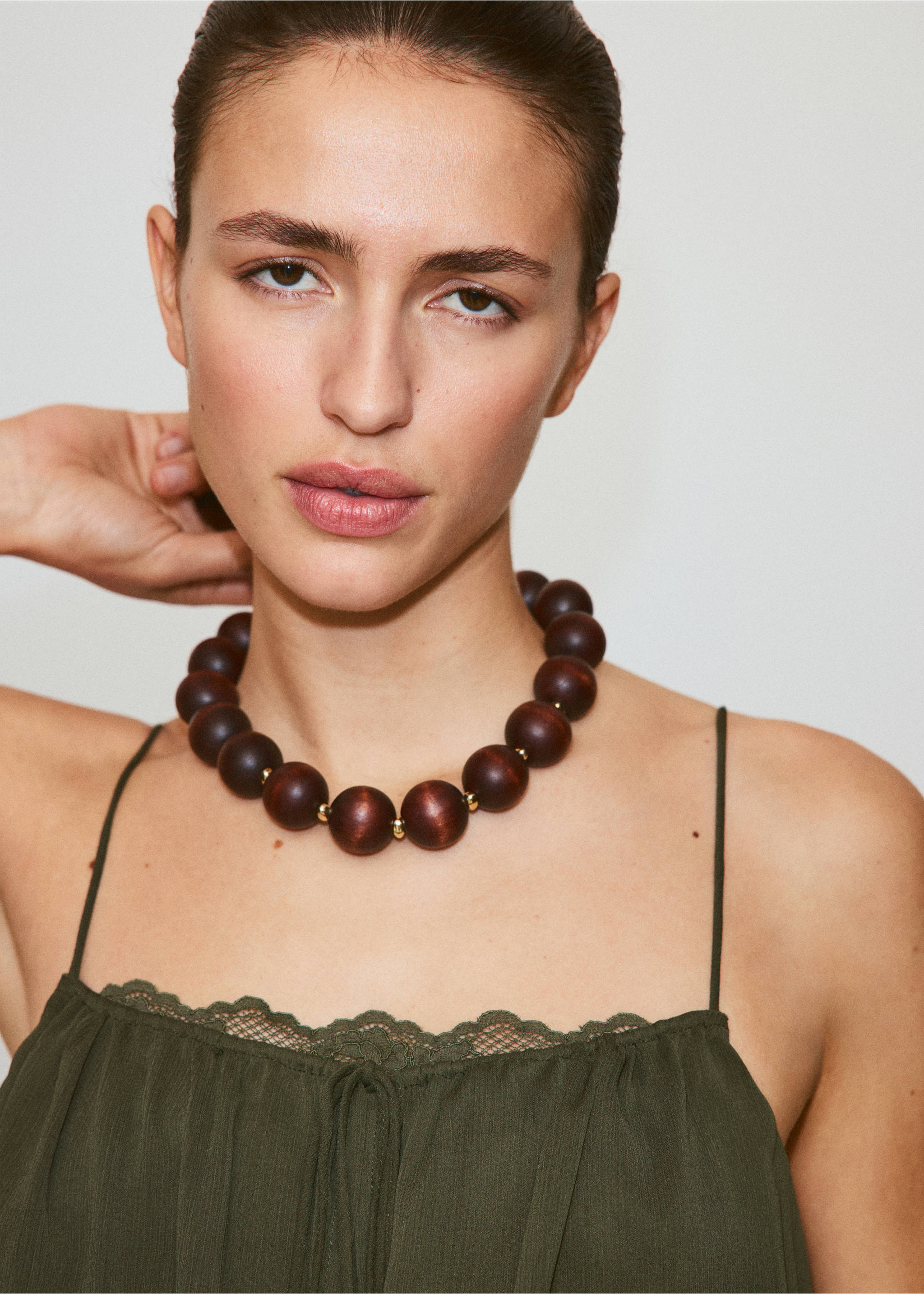 Short ruffled dress - Details of the article 1, Green. Ref: 27009092-01.