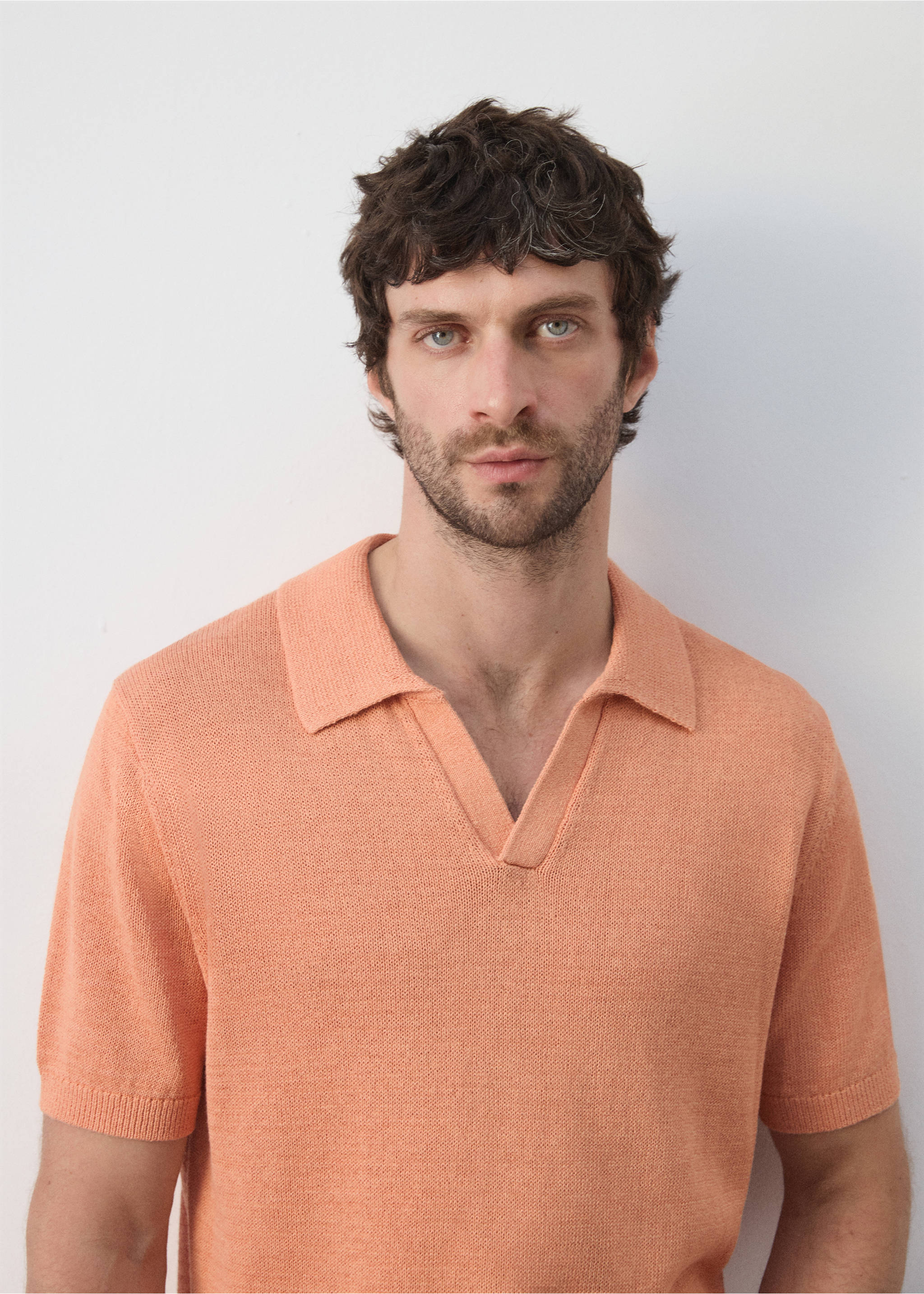 Cotton polo shirt with microstructure - Details of the article 1, Dark Orange. Ref: 27009210-01.
