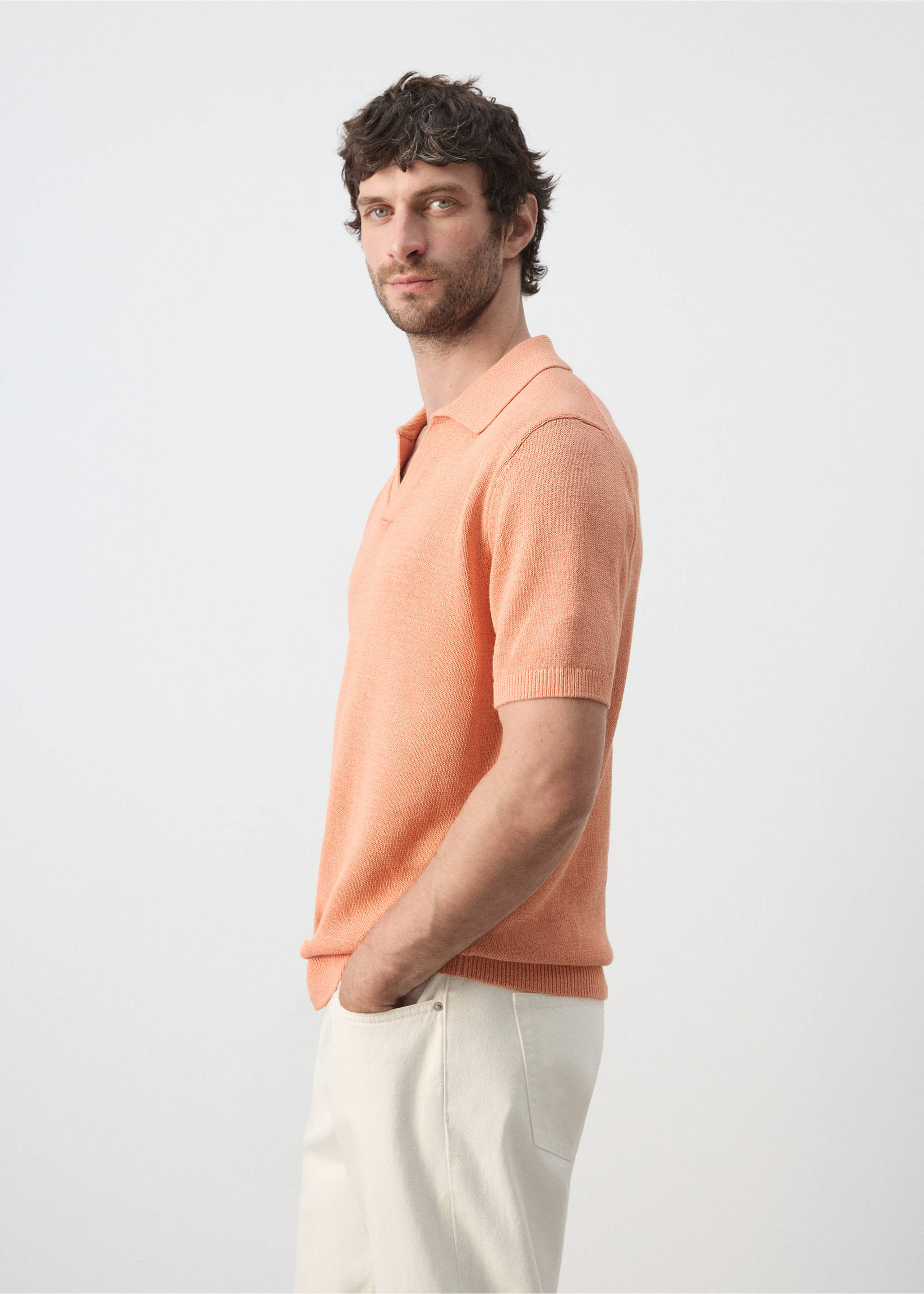 Cotton polo shirt with microstructure - Details of the article 2, Dark Orange. Ref: 27009210-01.