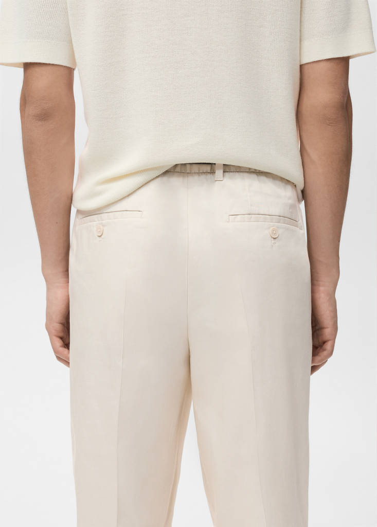 Regular-fit pleated flowy trousers — Beige
