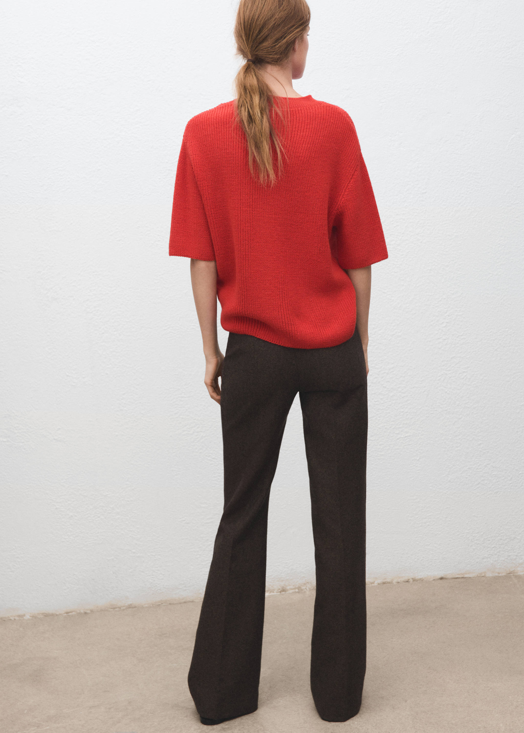 Three-quarter sleeve knitted sweater - Reverse of the article