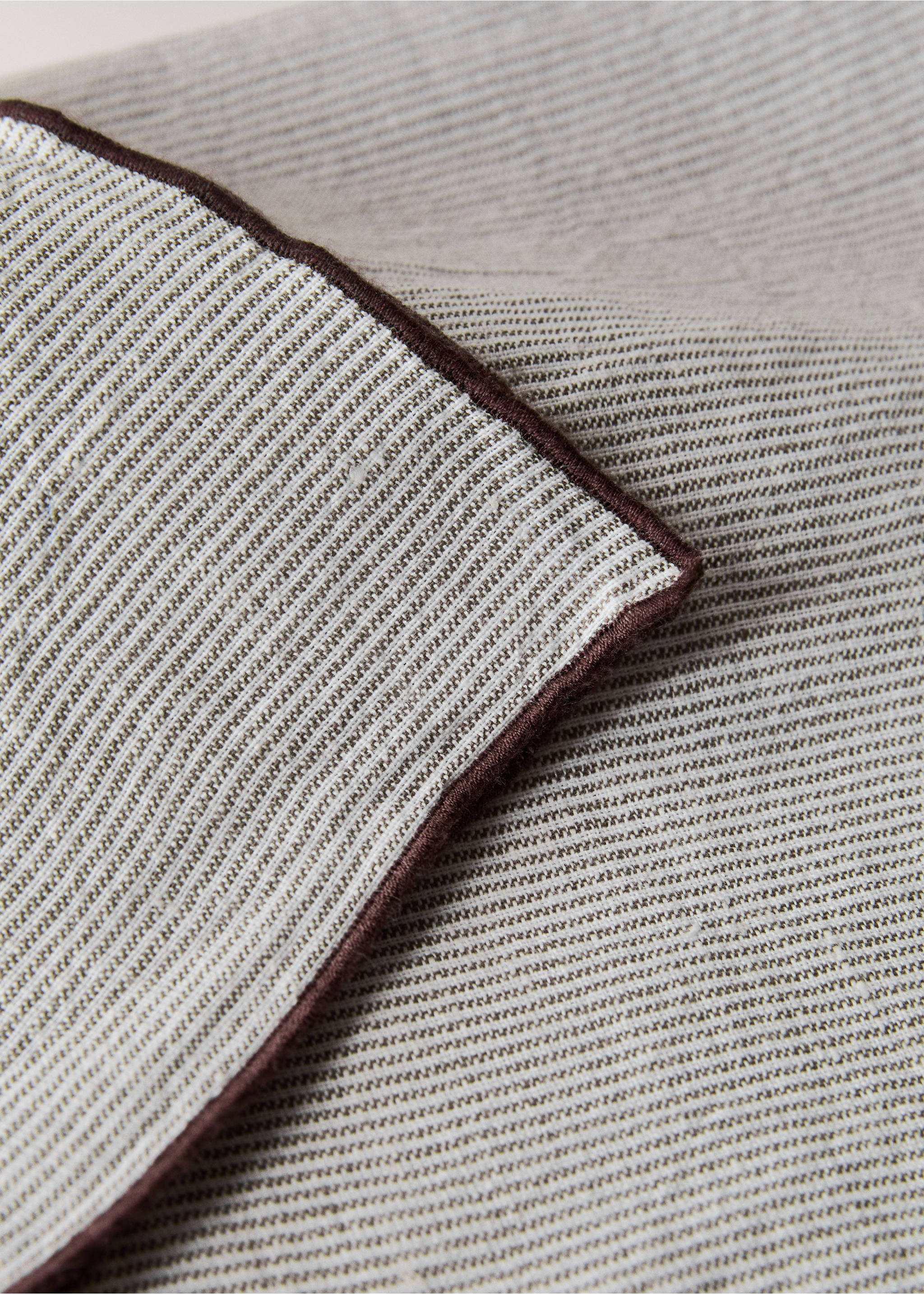 Linen cotton napkins with striped design - Details of the article 2, Light/Pastel Brown. Ref: 27011523-00.