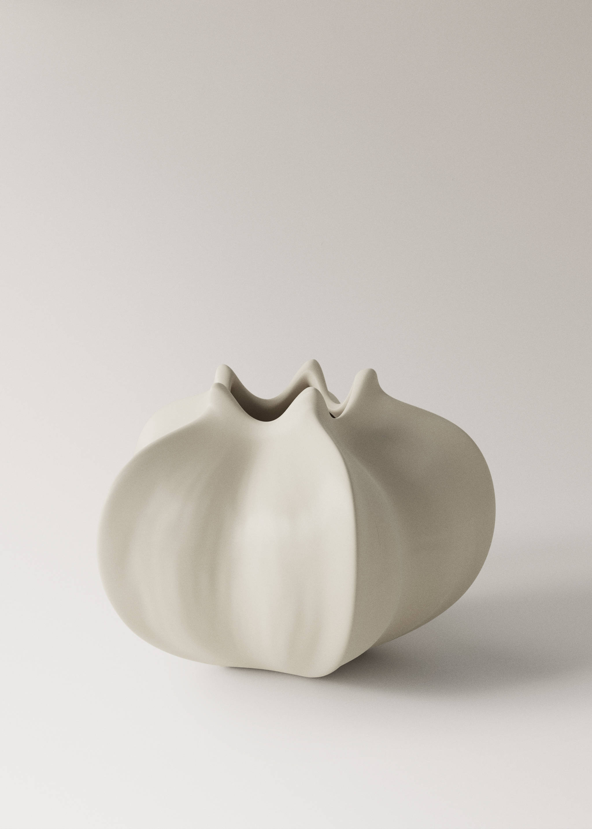 Låg blomvas i keramik - Artikel utan modell