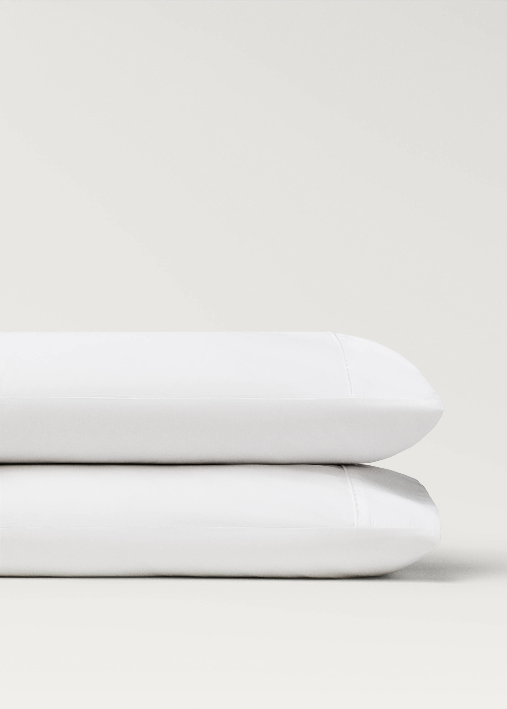 Two 500-thread count cotton percale pillowcases with rounded piping detail 50x75 cm - Details of the article 1, White. Ref: 27012941-00.