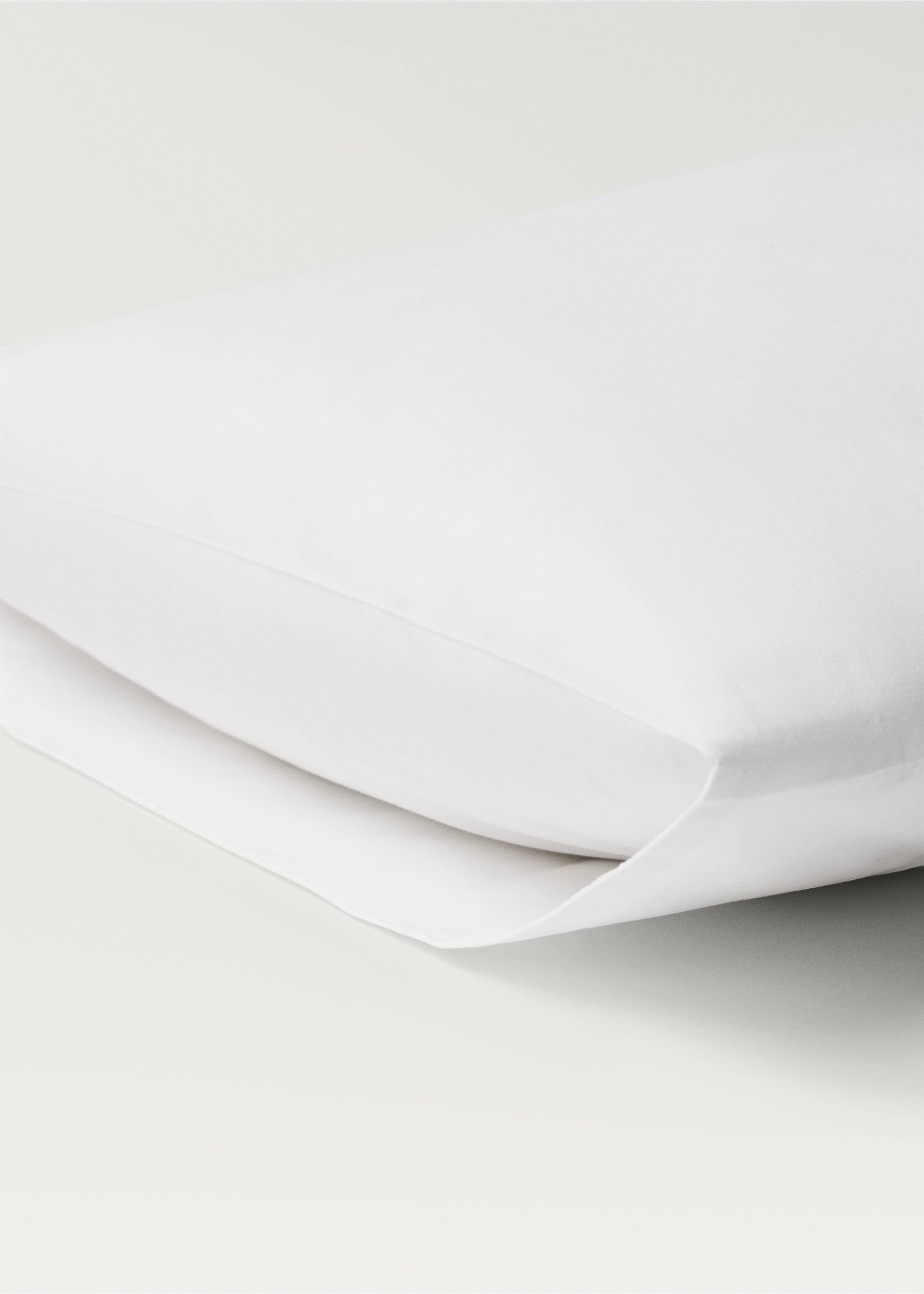 Two 500-thread count cotton percale pillowcases with rounded piping detail 50x75 cm - Details of the article 3, White. Ref: 27012941-00.