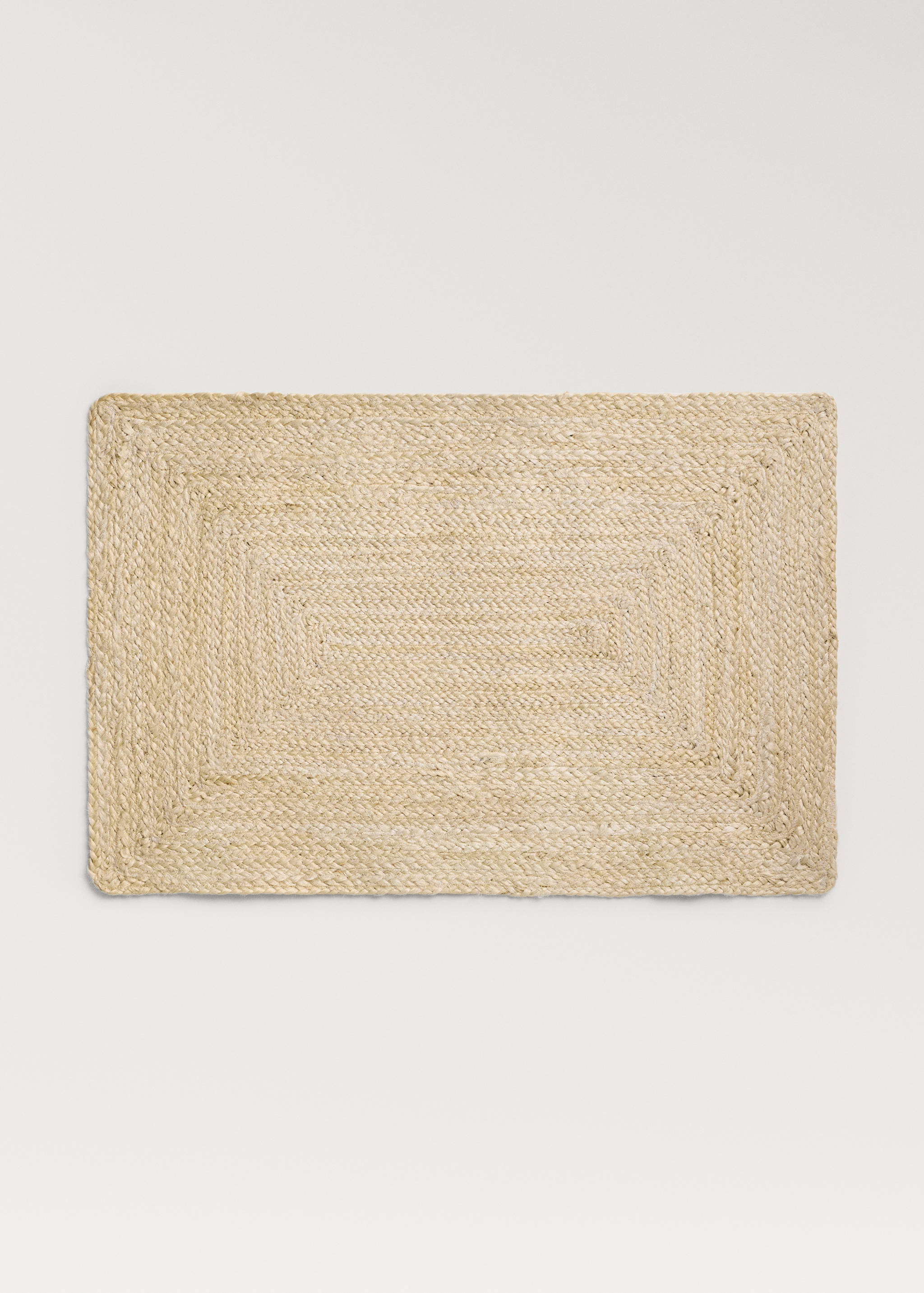 Small bleached braided jute carpet - Article without model
