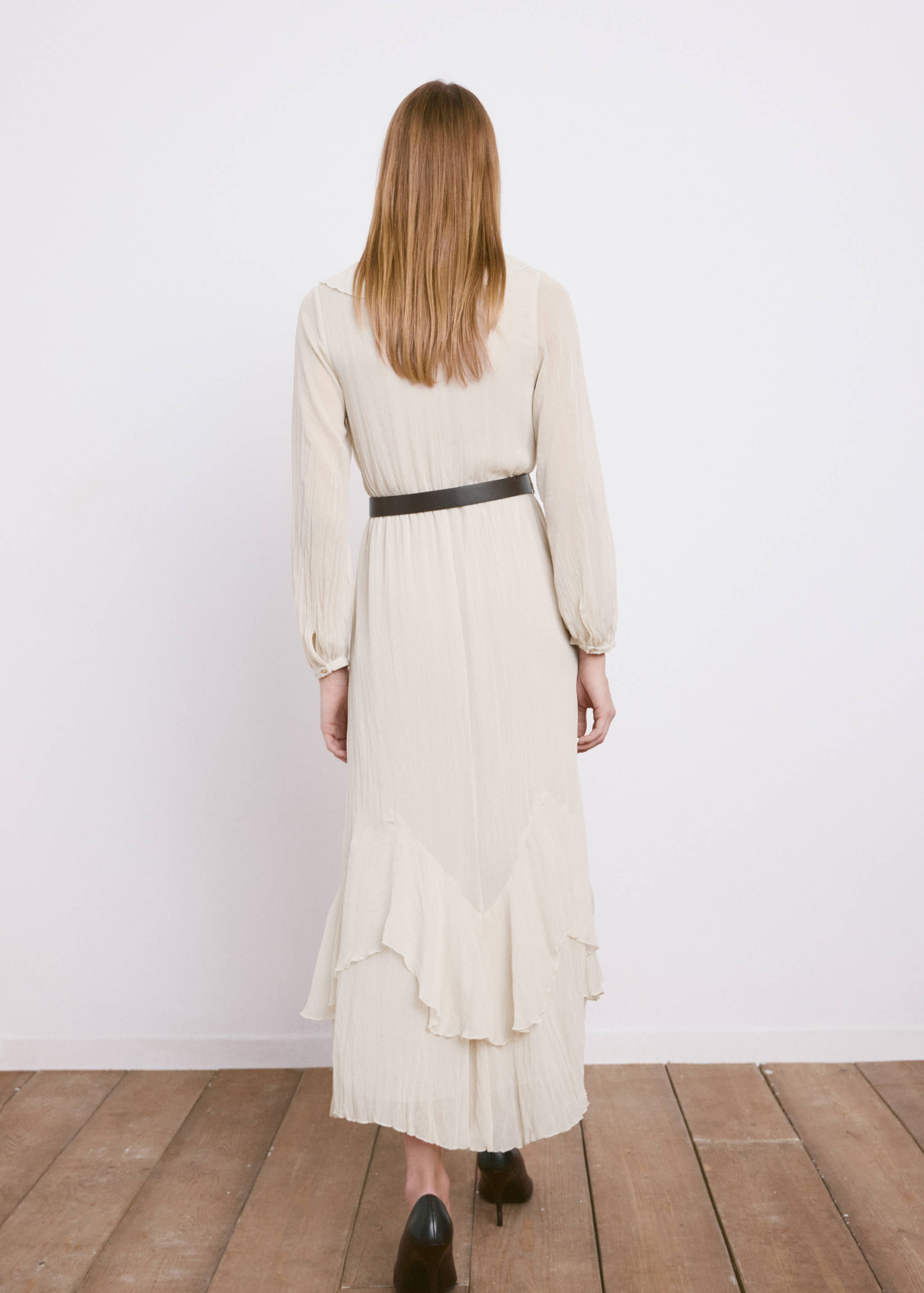 Long ruffled dress - Reverse of the article