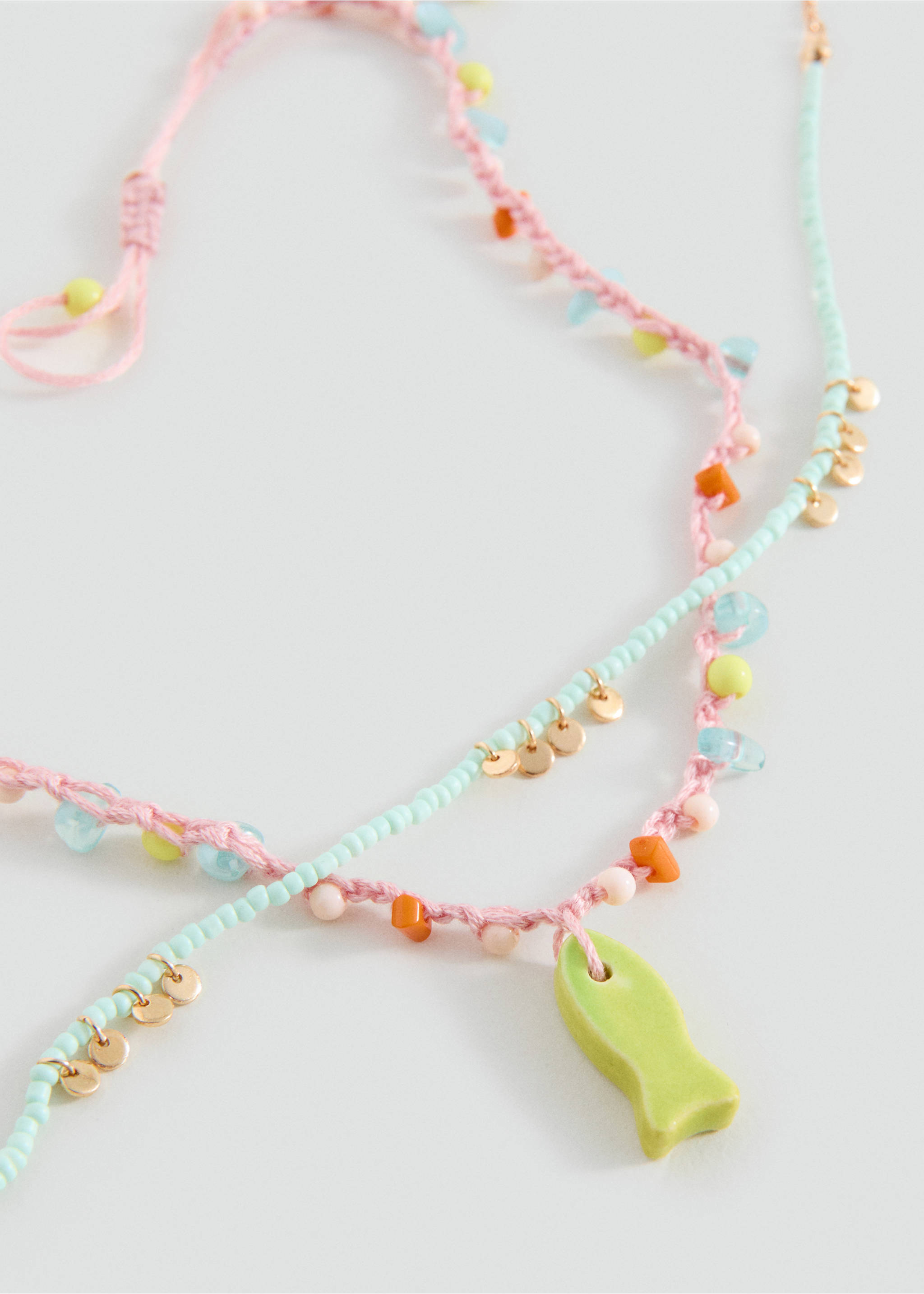 Combined necklace pack - Medium plane, Pale Pink. Ref: 27014785-00.