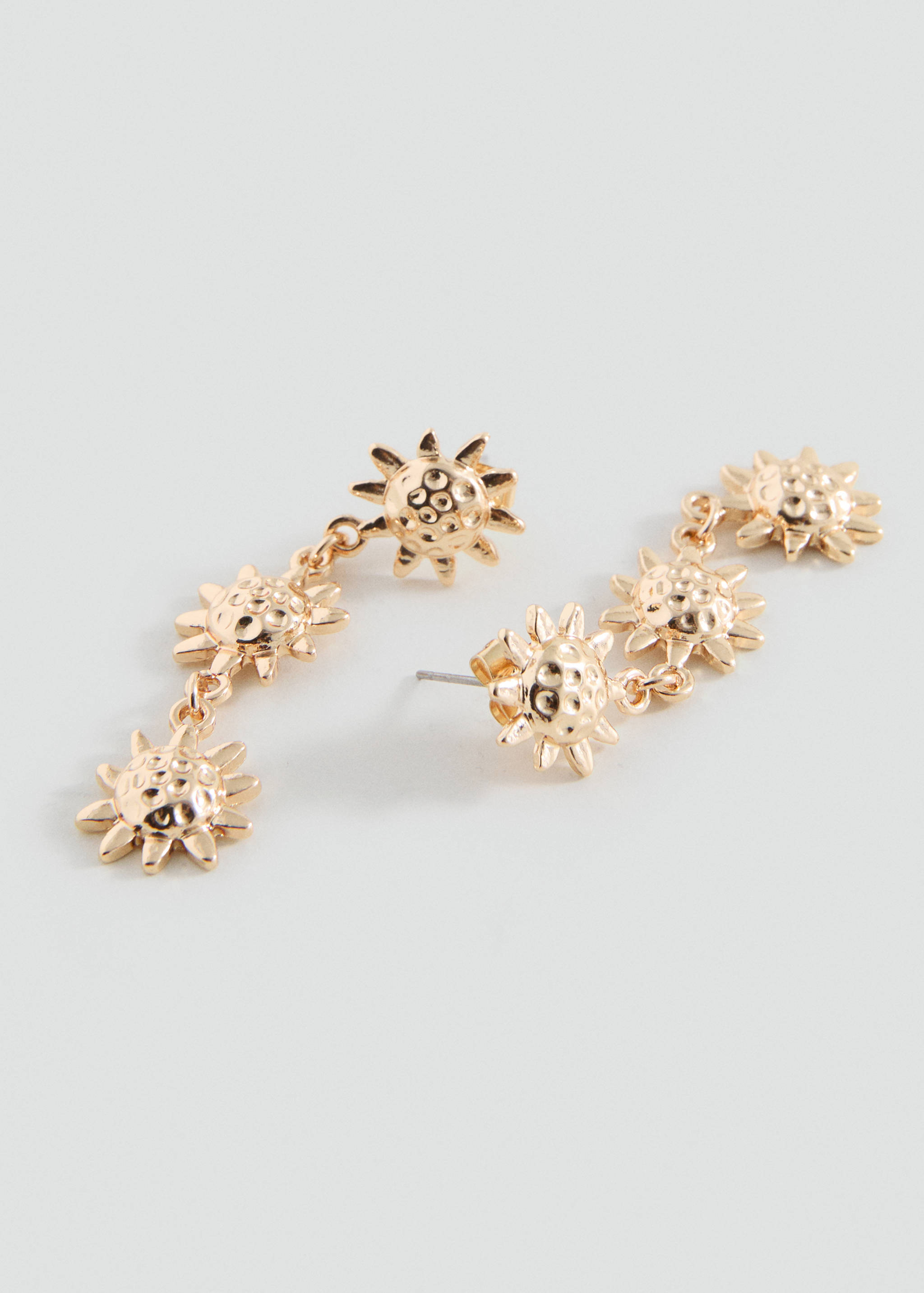 Boucles d'oreilles pendantes soleils - Plan moyen
