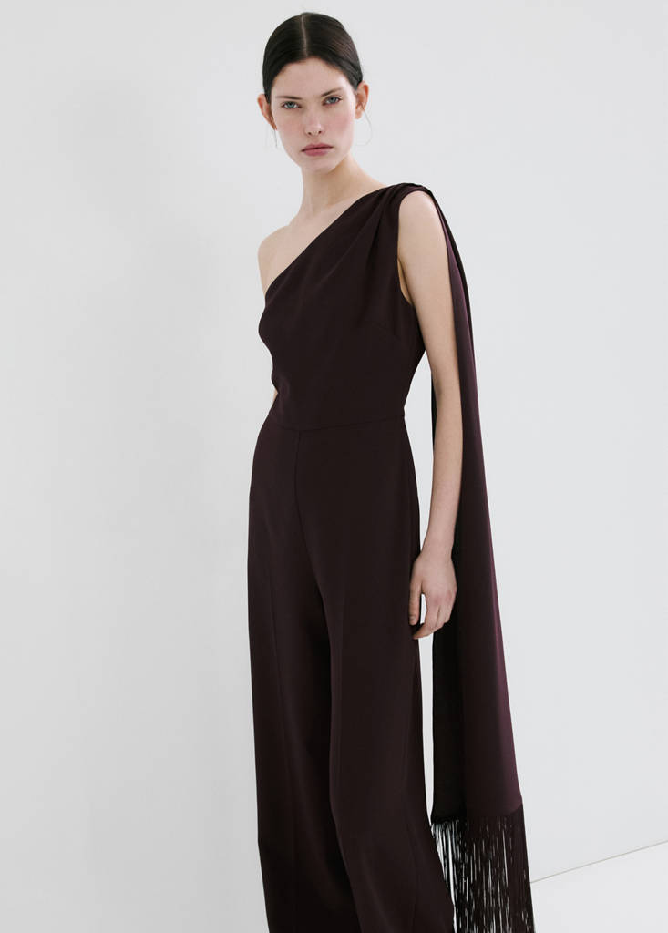 Asymmetrical jumpsuit with fringed scarf