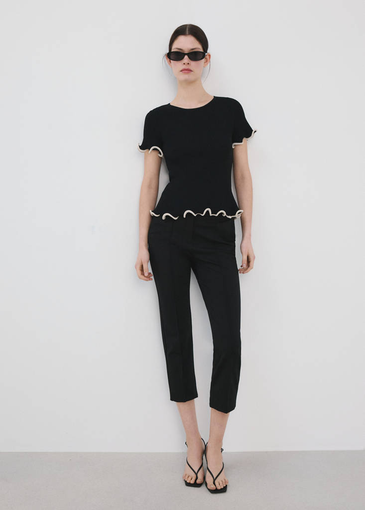 Peplum jumper with contrasting trims — Black