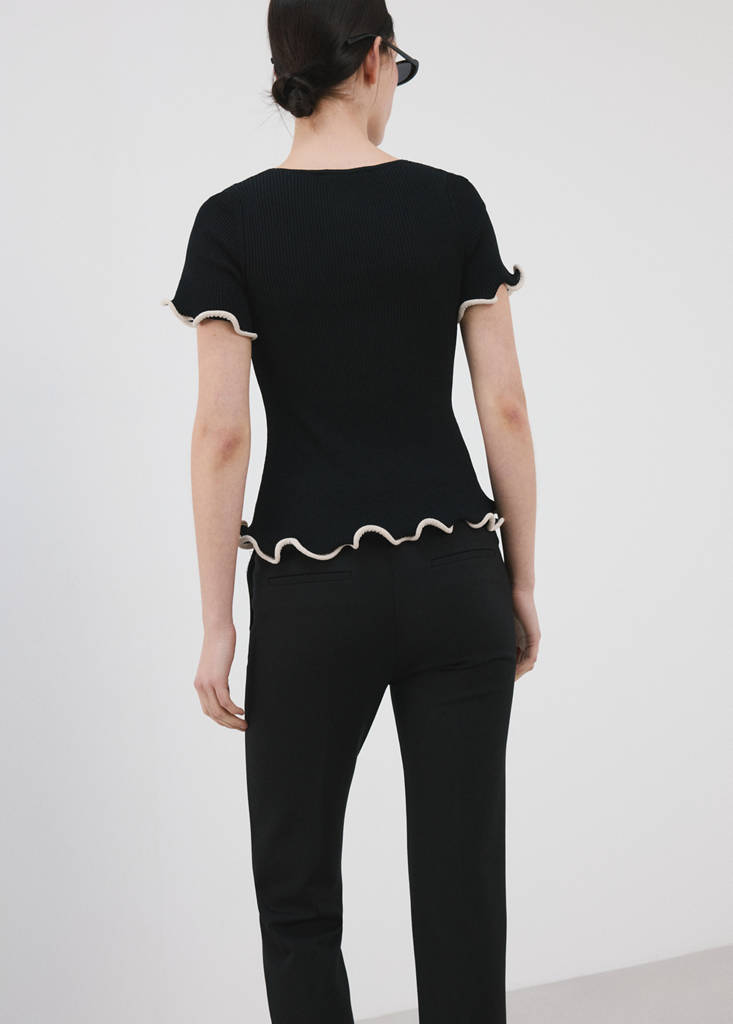 Peplum jumper with contrasting trims — Black