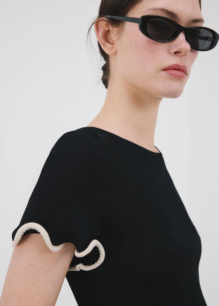 Peplum jumper with contrasting trims — Black