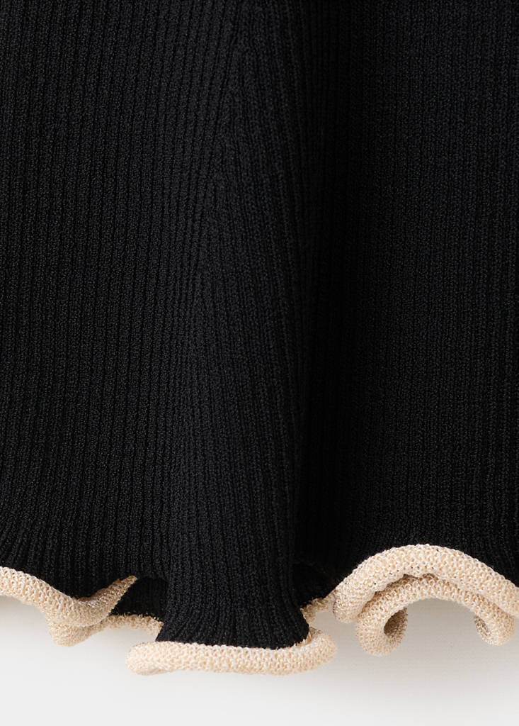 Peplum jumper with contrasting trims — Black