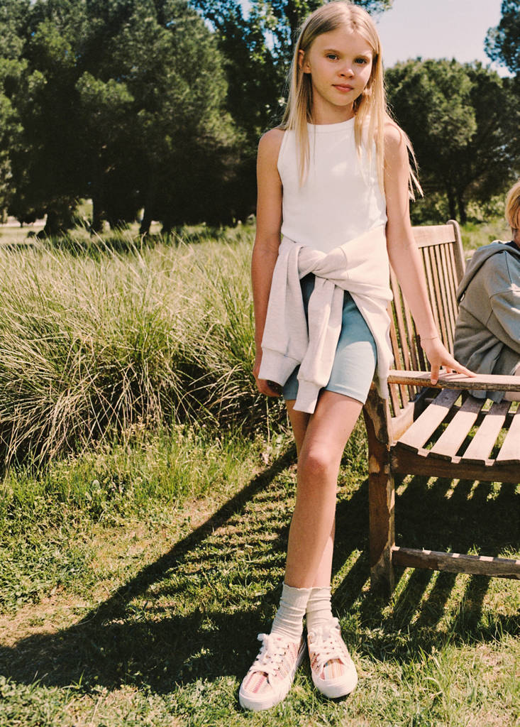 Ribbed cotton-blend top — Off White