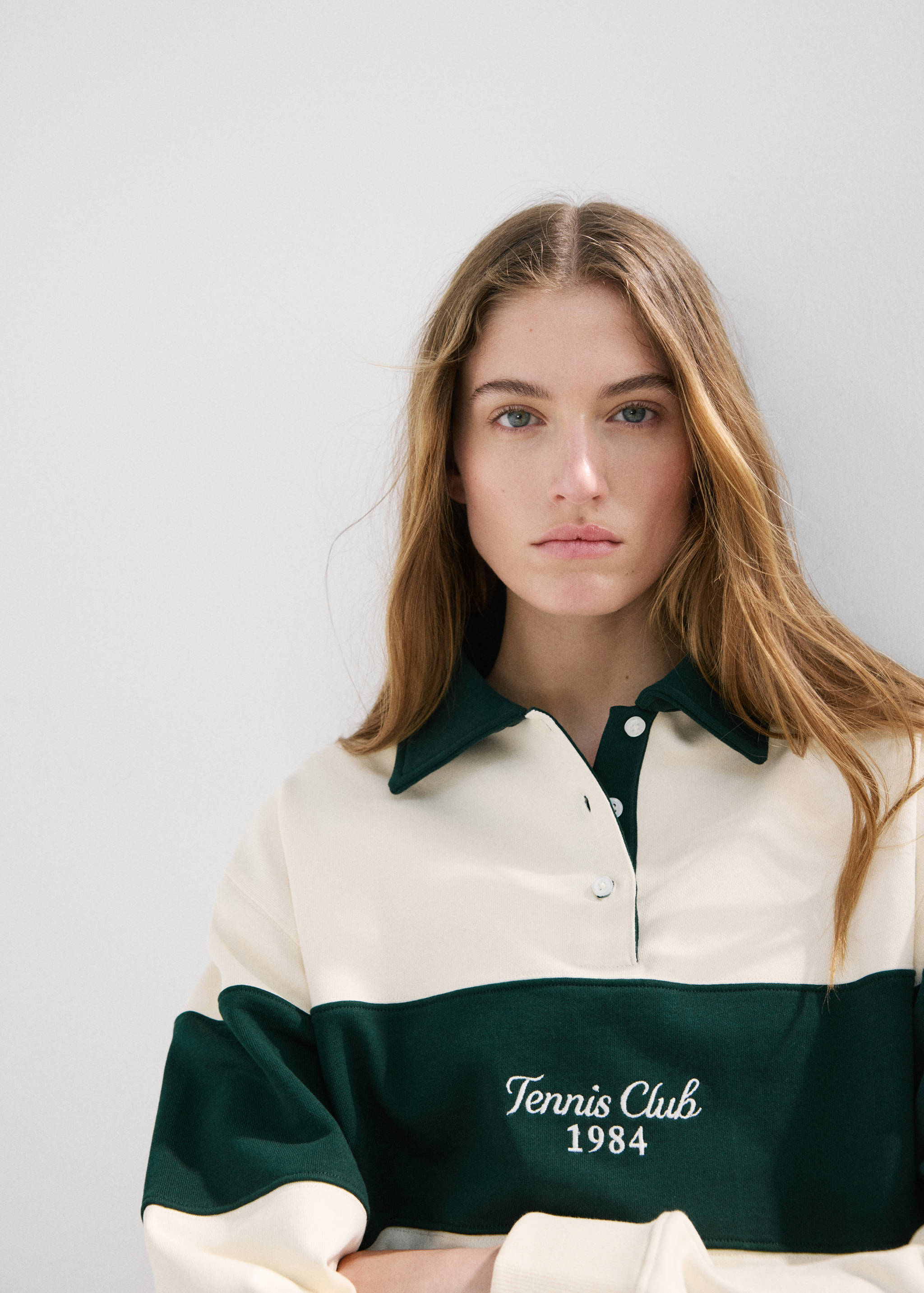 Dessuadora coll polo missatge brodat - Detall de l'article 1