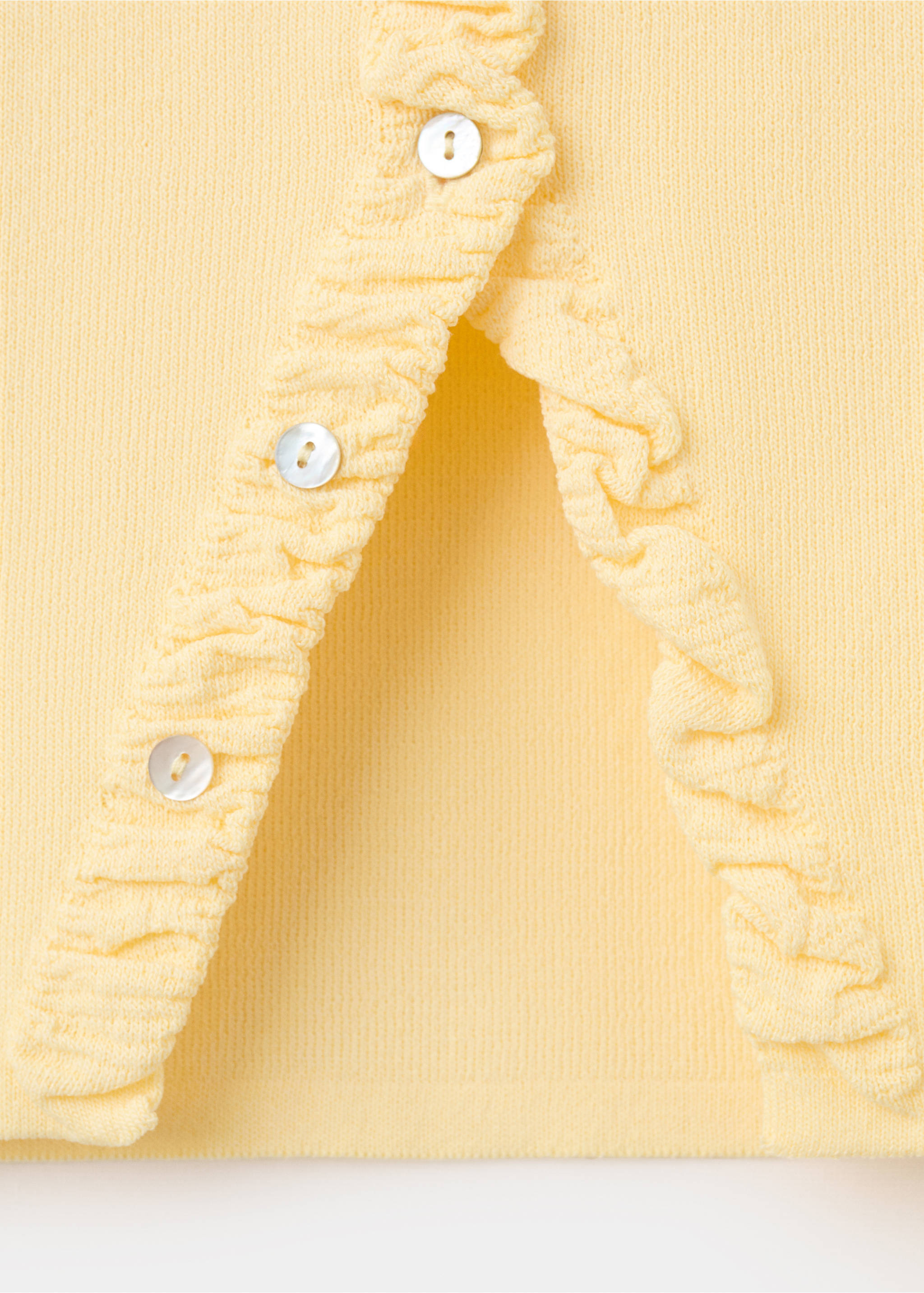 Fine knit sweater with buttons - Details of the article 8, Vanilla. Ref: 27017170-00.