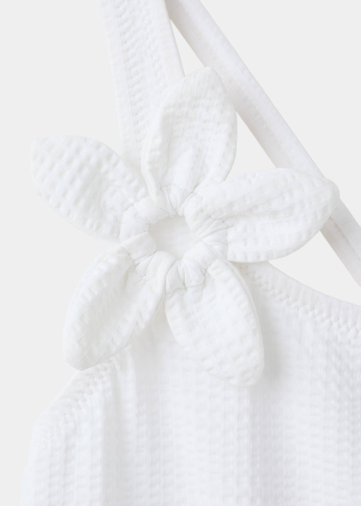 Asymmetric swimsuit with raised flower — White