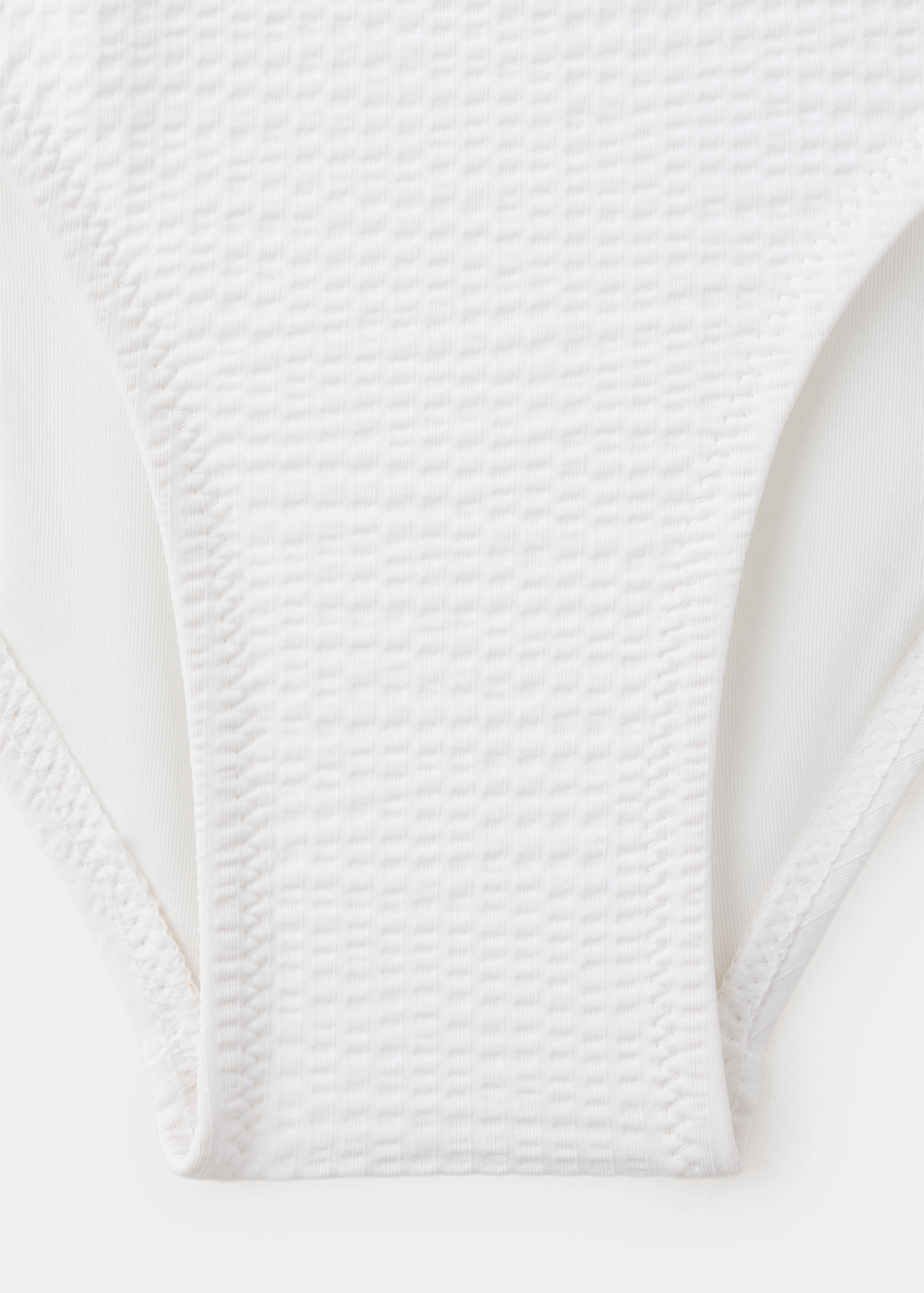 Asymmetric swimsuit with raised flower - Details of the article 0