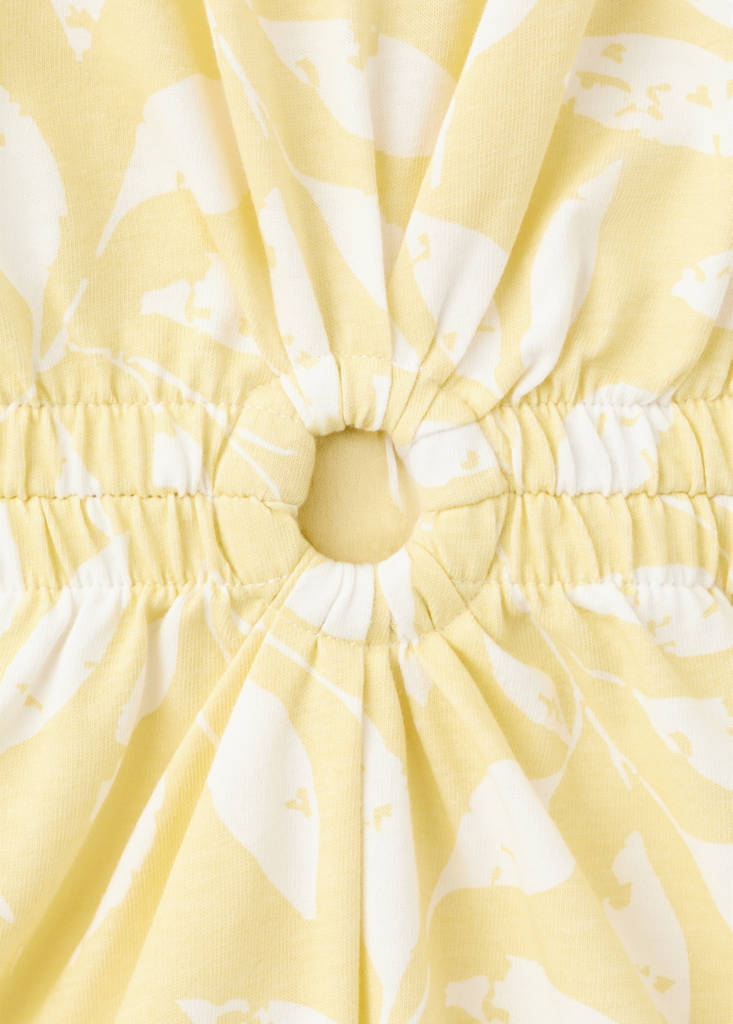 Printed jumpsuit with openings — Pastel Yellow