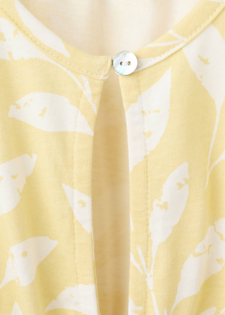 Printed jumpsuit with openings — Pastel Yellow