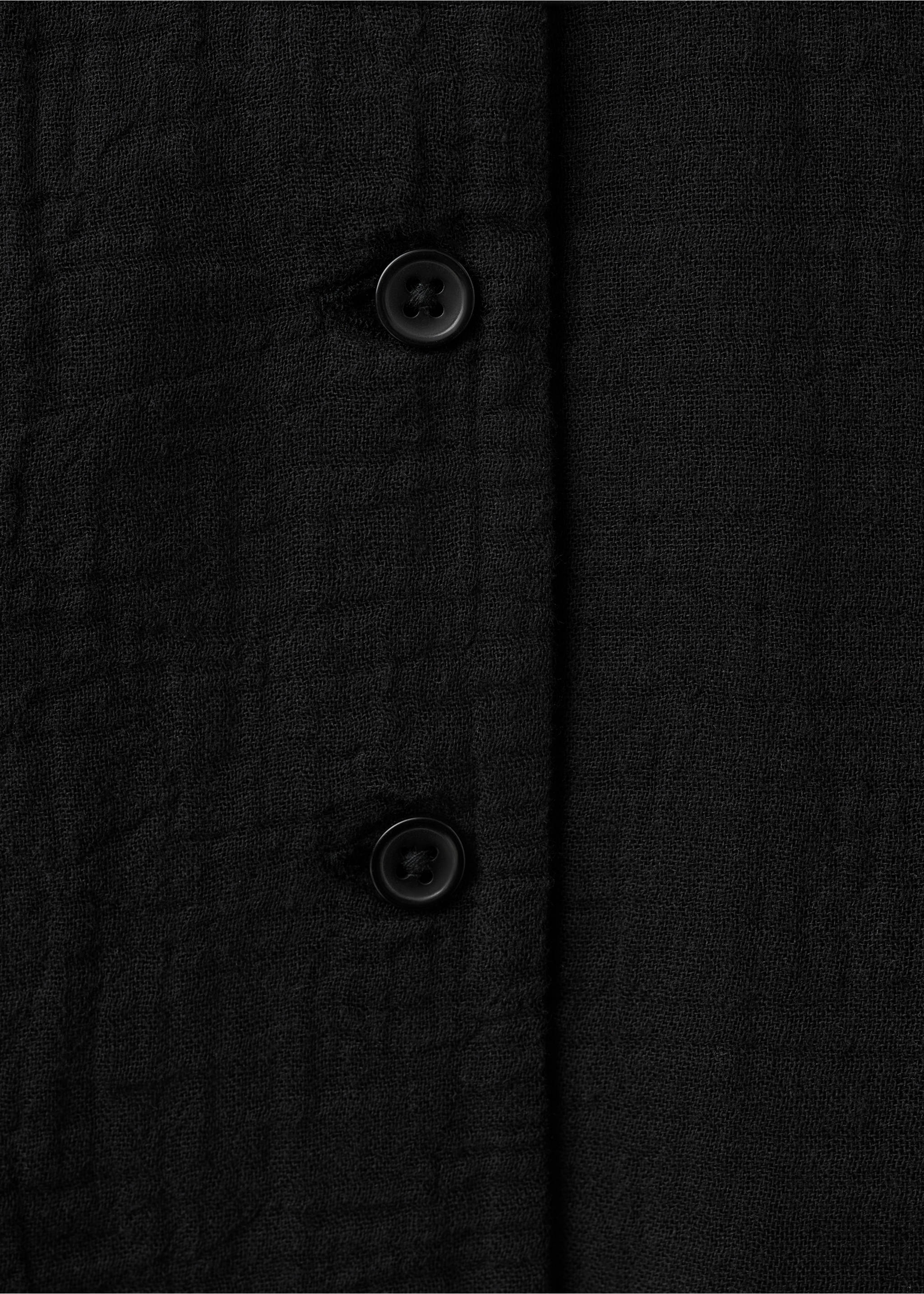 Haltertop met knopen - Detail van het artikel 8, Zwart. Ref: 27019056-00.