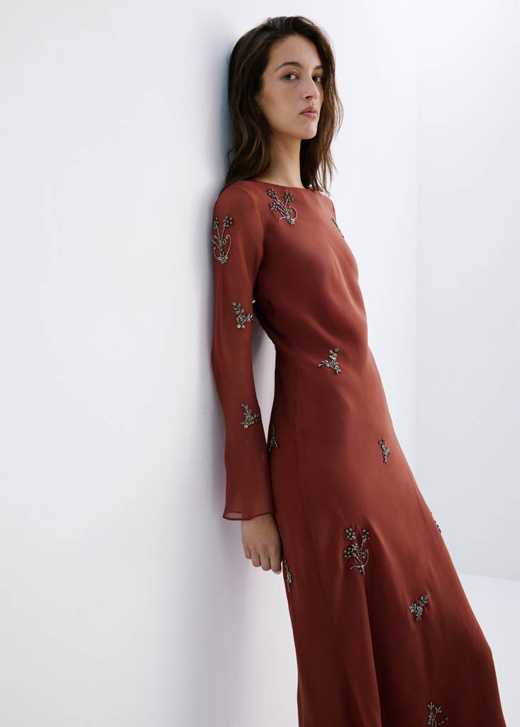 Dress with embroidered crystals and flared sleeves