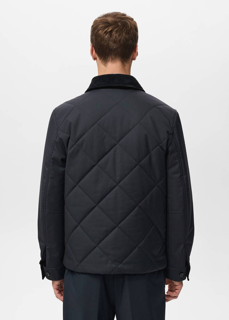 Quilted water repellent jacket — Night Blue